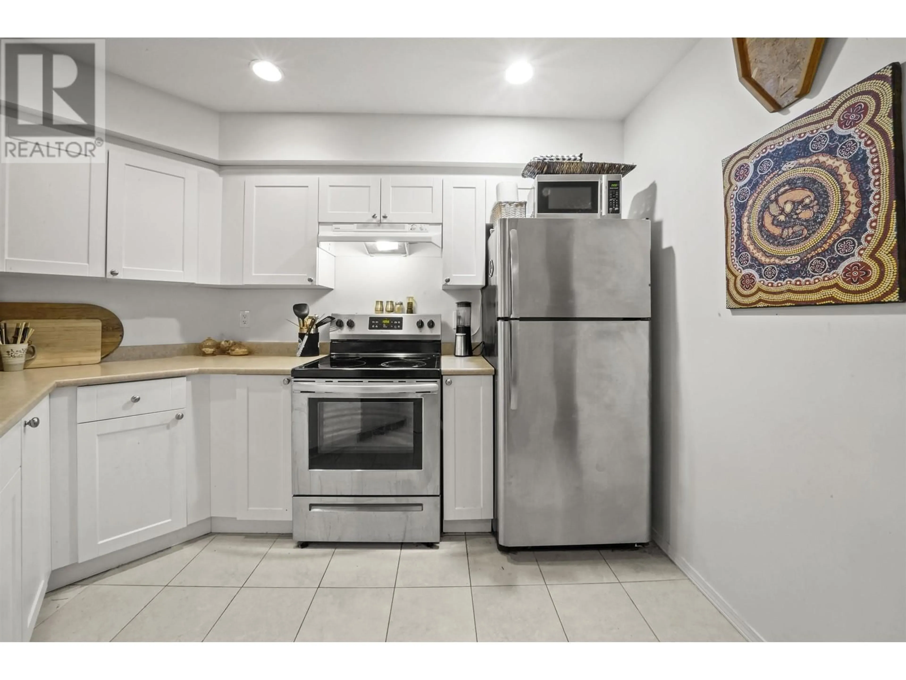 Standard kitchen, ceramic/tile floor for 209 2915 GLEN DRIVE, Coquitlam British Columbia V3B7H8