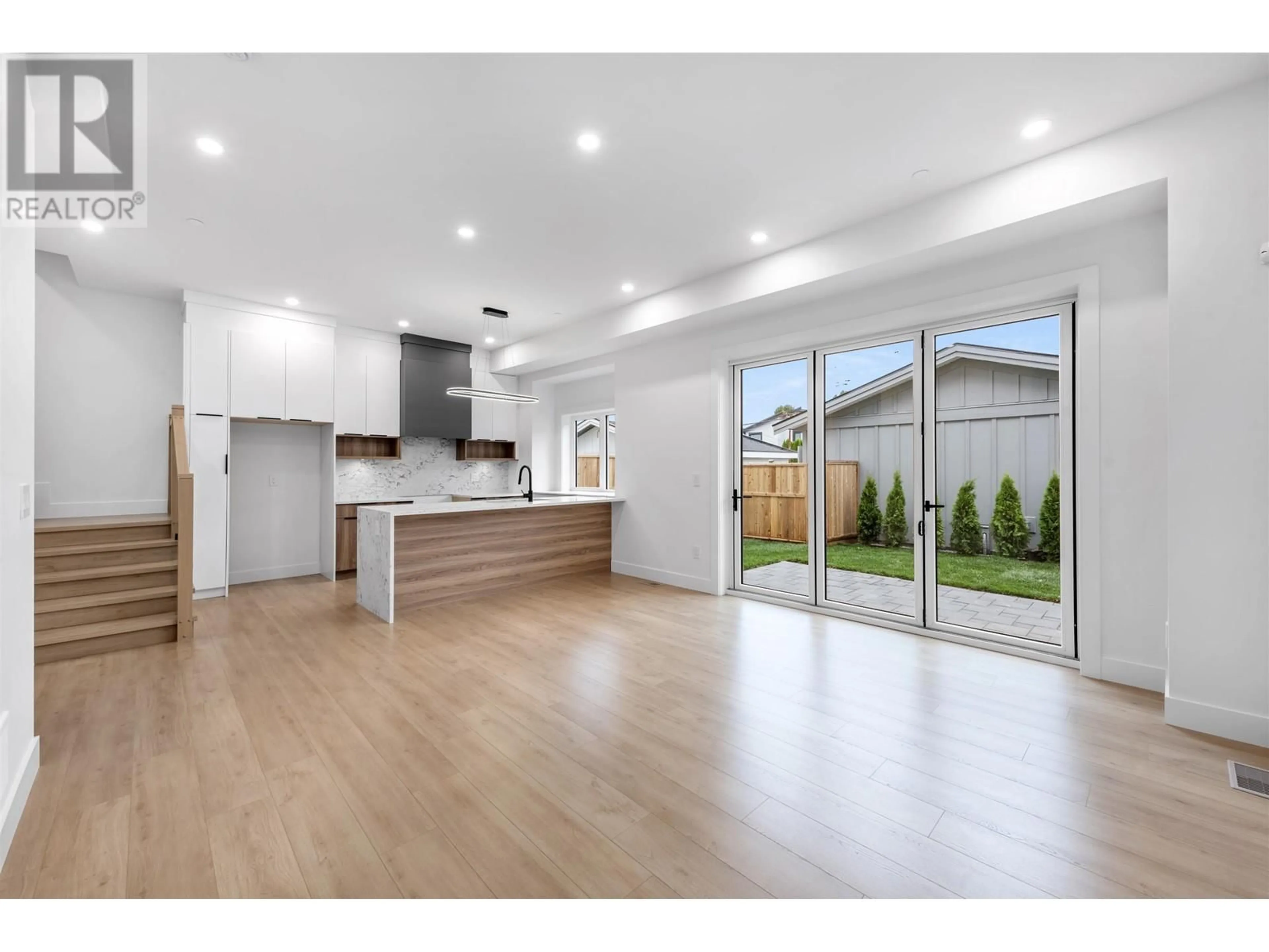 Open concept kitchen, wood/laminate floor for 2 - 1160 ROSSLAND STREET, Vancouver British Columbia V5K4A1