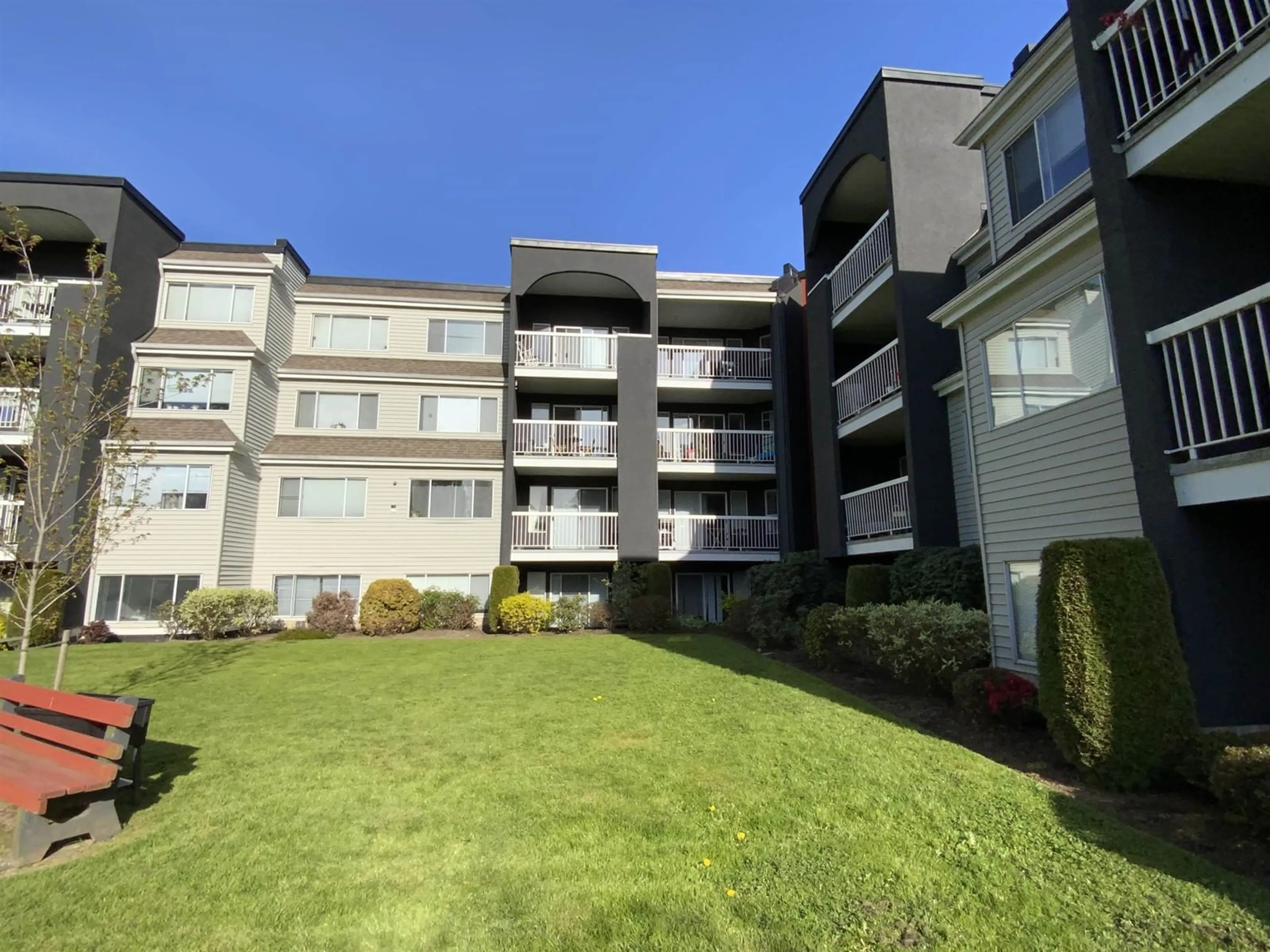 A pic from outside/outdoor area/front of a property/back of a property/a pic from drone, unknown for 208 5700 200 STREET, Langley British Columbia V3A7S6