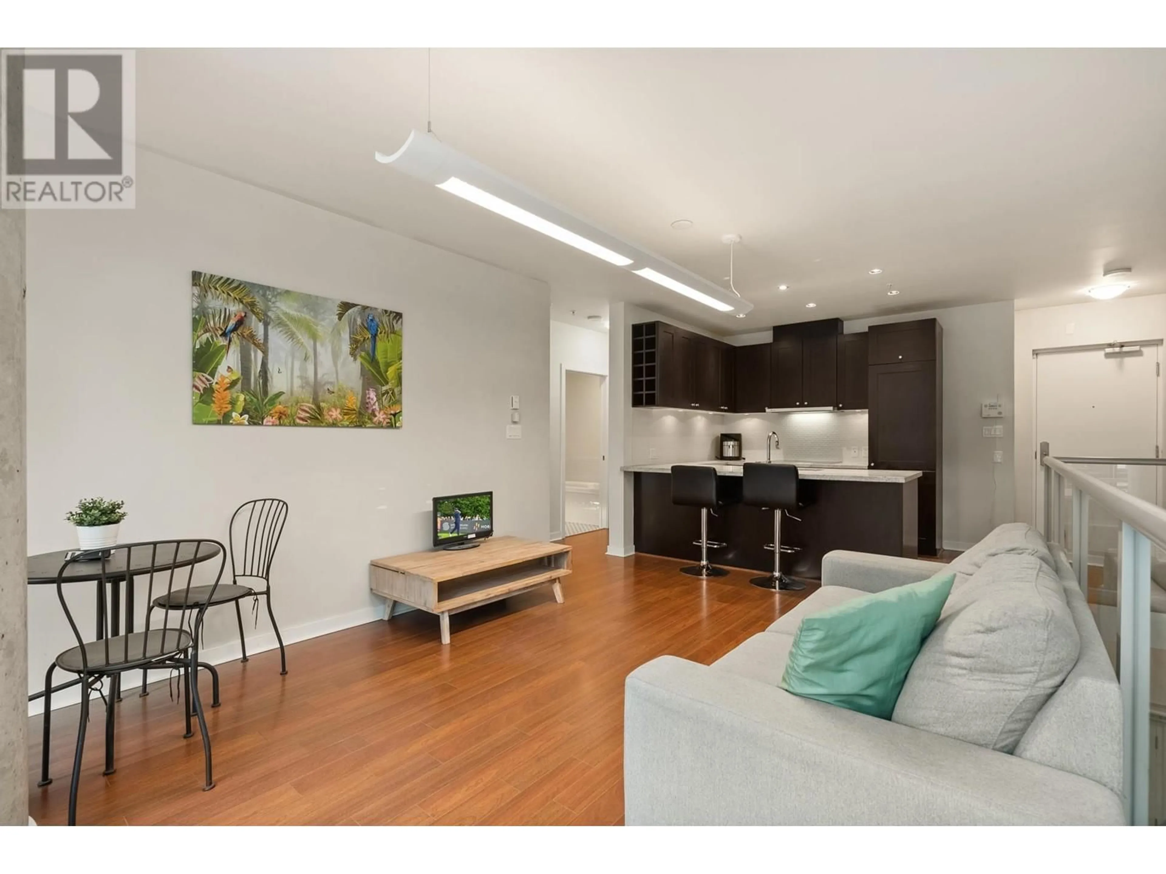 Living room with furniture, wood/laminate floor for 817 CAMBIE STREET, Vancouver British Columbia V6B2P4