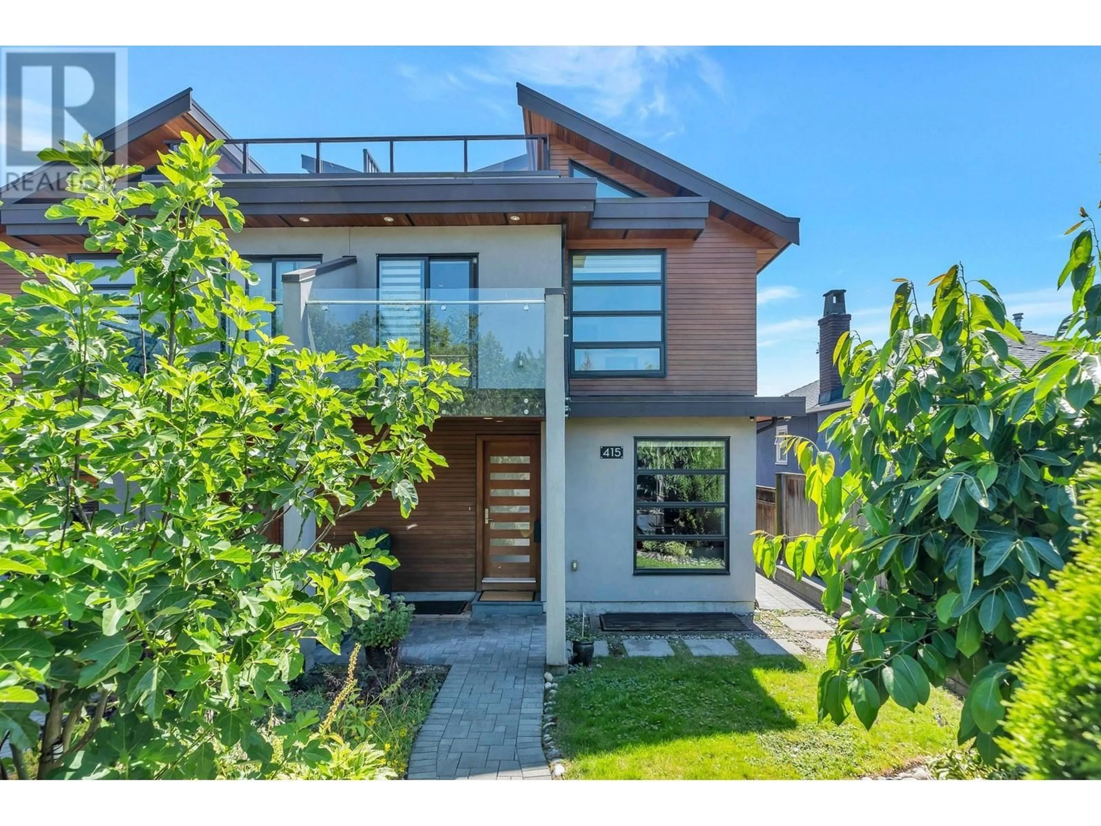 Home with vinyl exterior material, street for 415 W KEITH ROAD, North Vancouver British Columbia V7M1M2