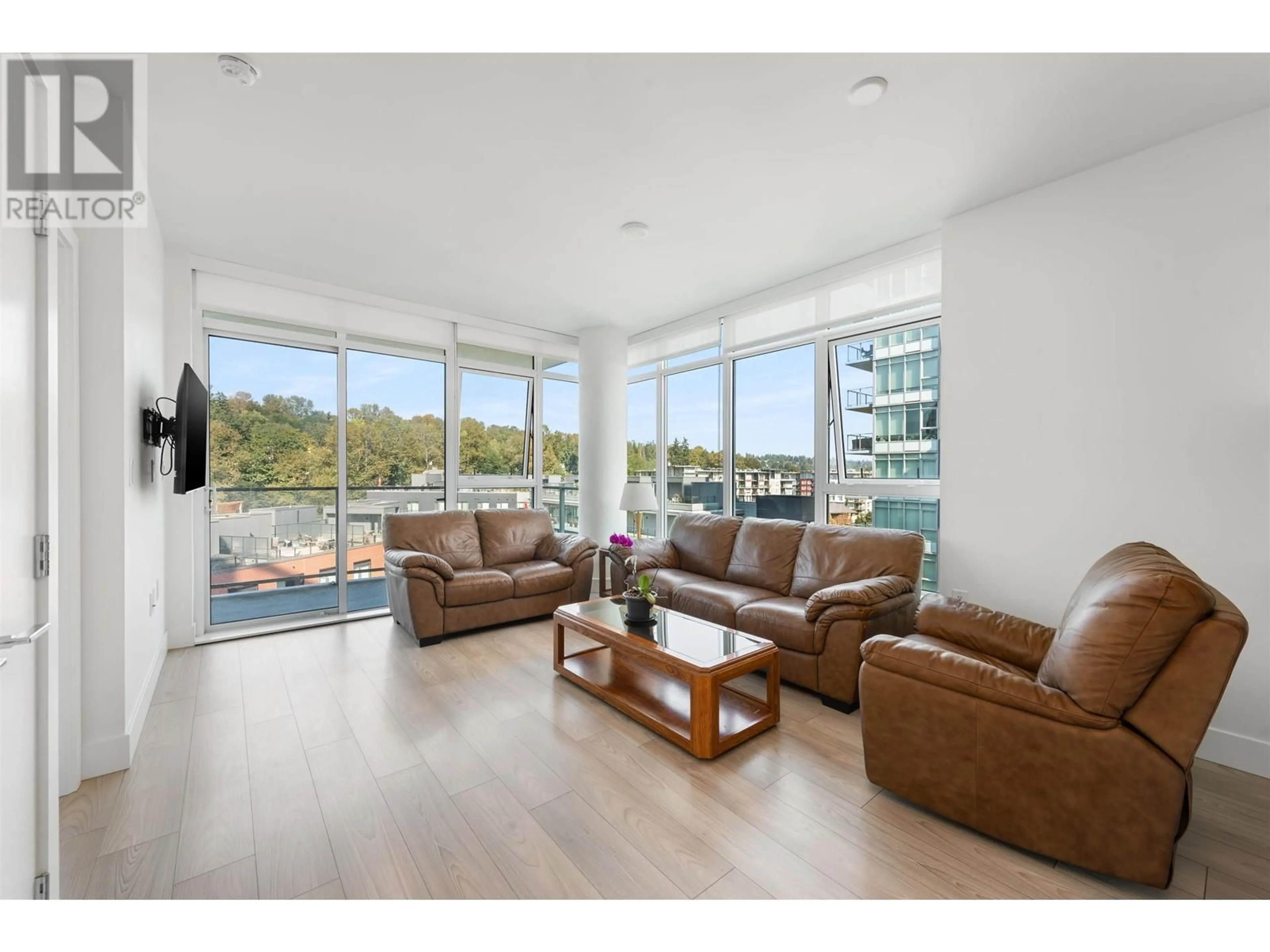 Living room with furniture, wood/laminate floor for 808 8570 RIVERGRASS DRIVE, Vancouver British Columbia V5S0H4