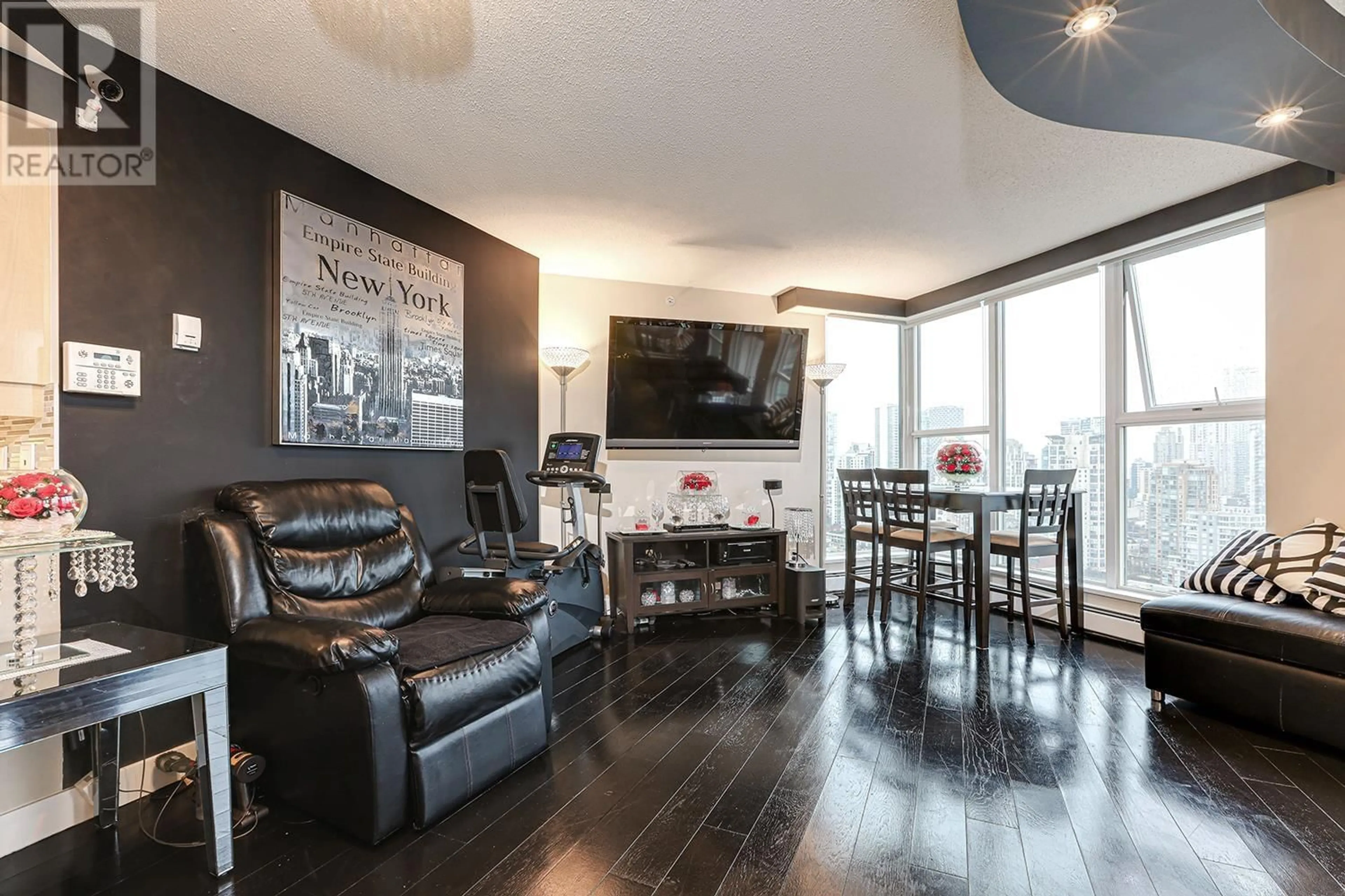 Living room with furniture, wood/laminate floor for 3502 1009 EXPO BOULEVARD, Vancouver British Columbia V6Z2V9