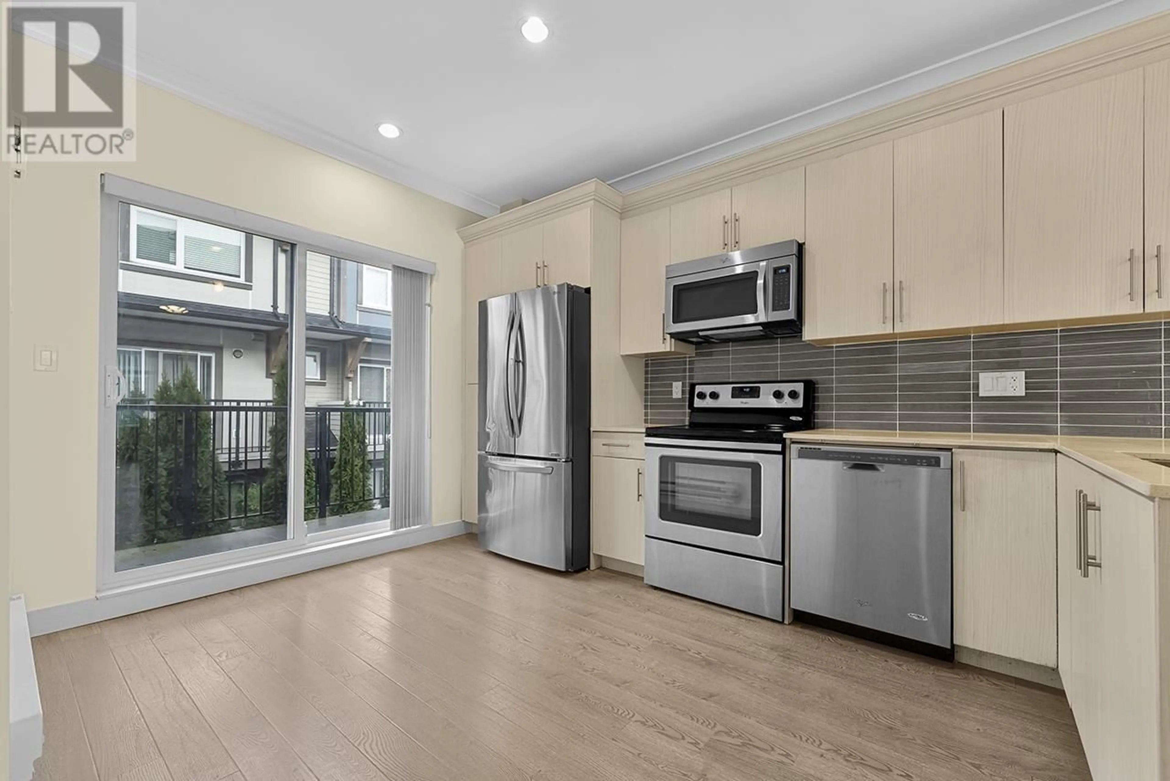 Open concept kitchen, unknown for 2 4191 NO. 4 ROAD, Richmond British Columbia V6X2M2