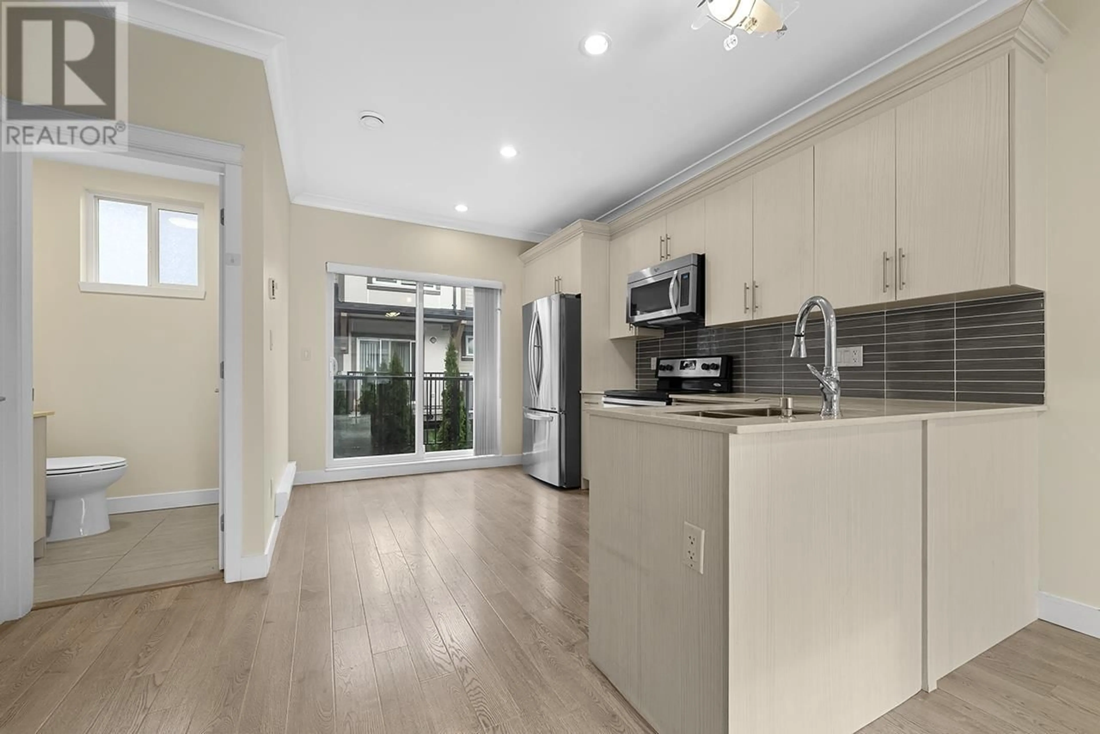 Open concept kitchen, unknown for 2 4191 NO. 4 ROAD, Richmond British Columbia V6X2M2