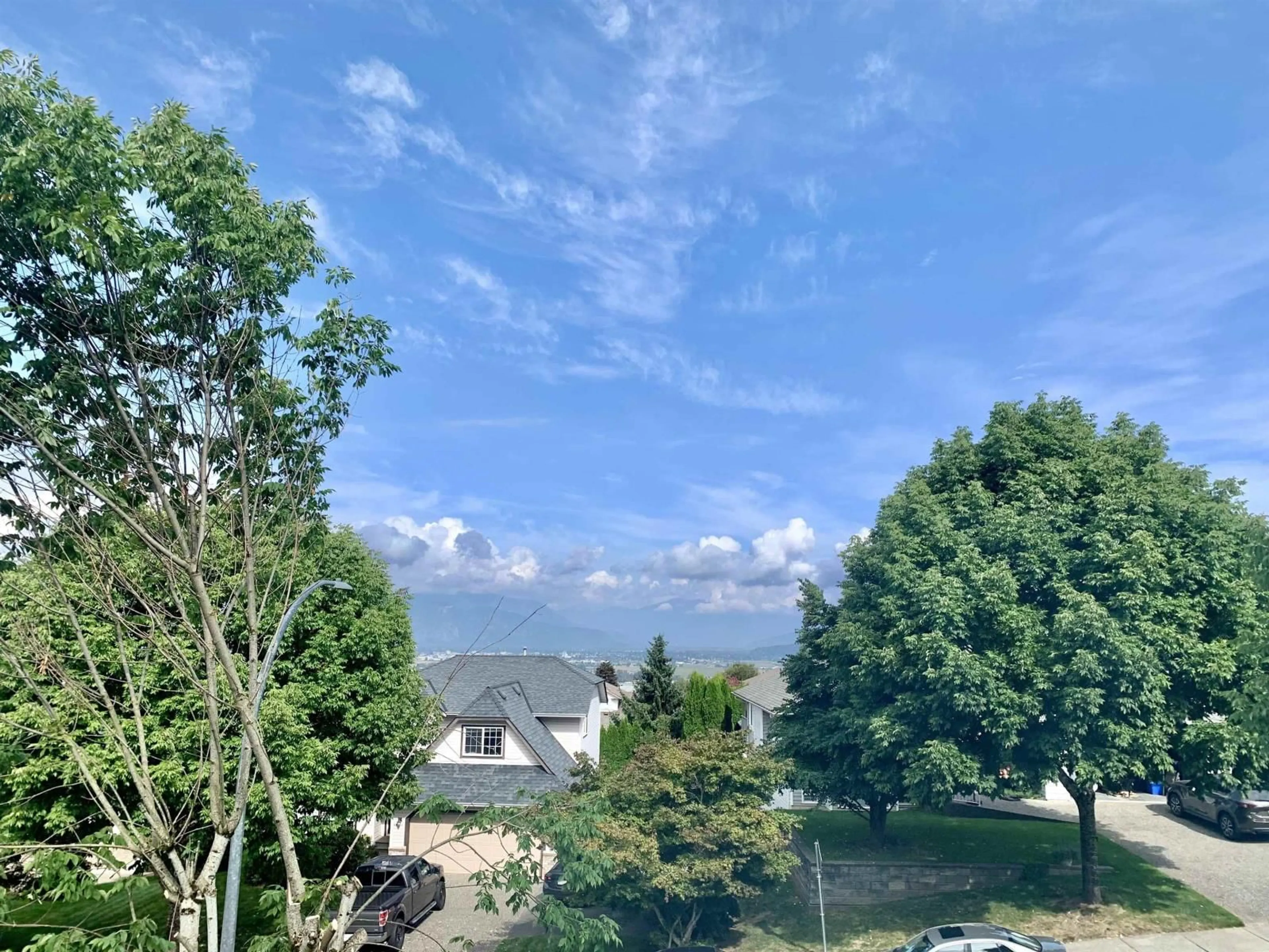 A pic from outside/outdoor area/front of a property/back of a property/a pic from drone, water/lake/river/ocean view for 46690 SYLVAN DRIVE, Chilliwack British Columbia V2R3W5