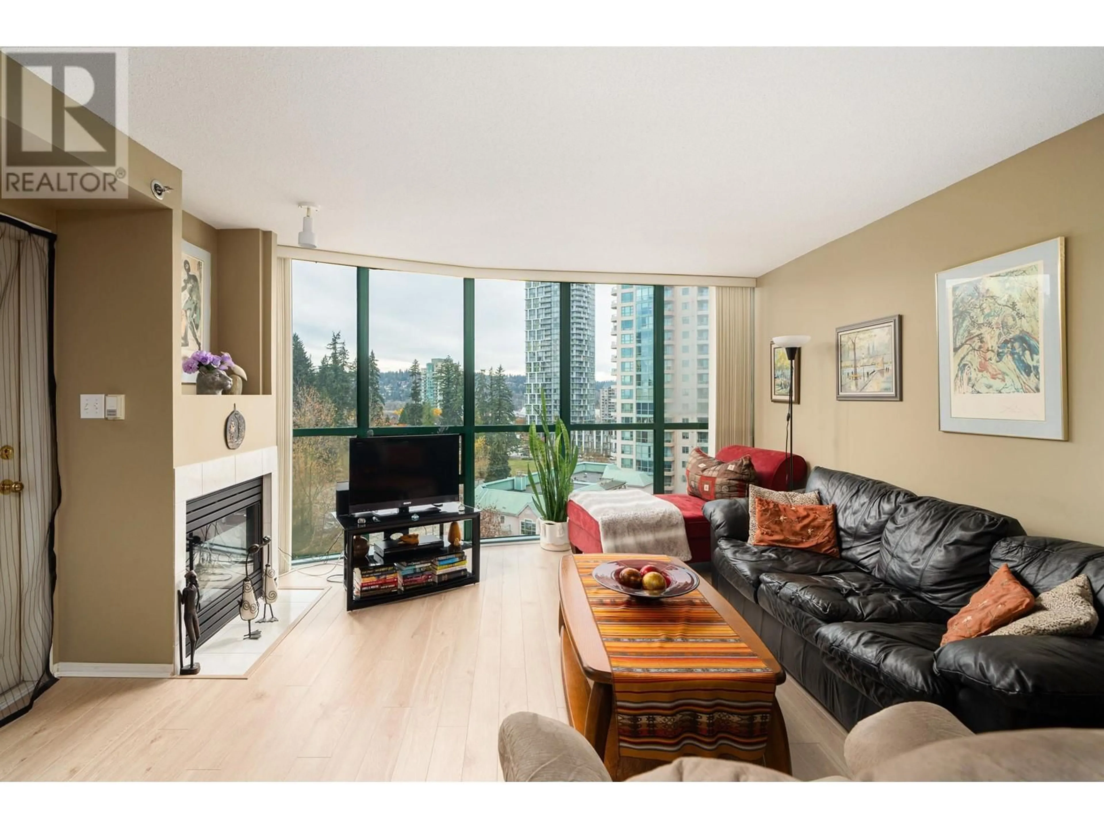 Living room with furniture, wood/laminate floor for 904 1189 EASTWOOD STREET, Coquitlam British Columbia V3B7N5