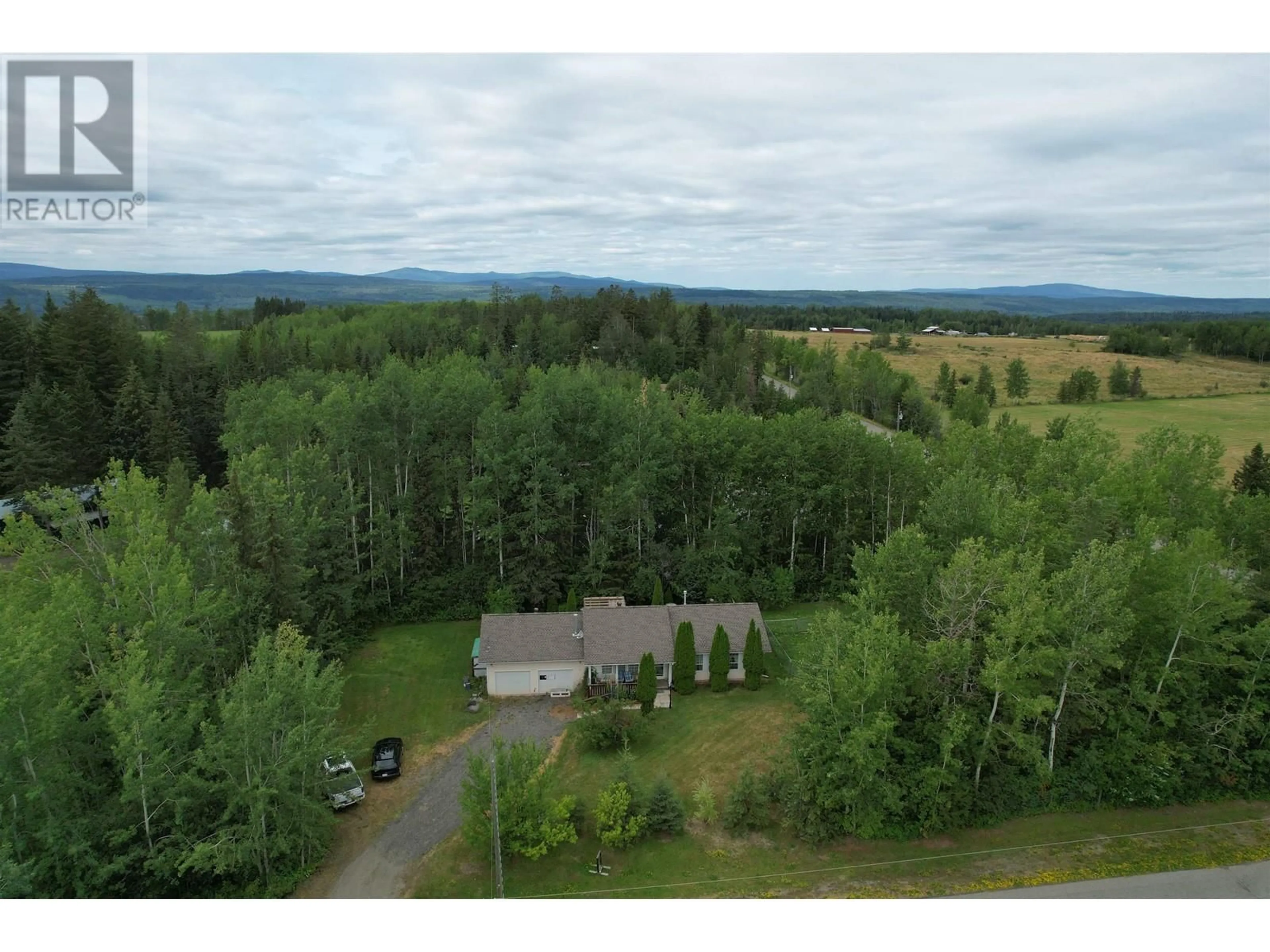 A pic from outside/outdoor area/front of a property/back of a property/a pic from drone, forest/trees view for 3856 DALE LAKE ROAD, Quesnel British Columbia V2J6E9