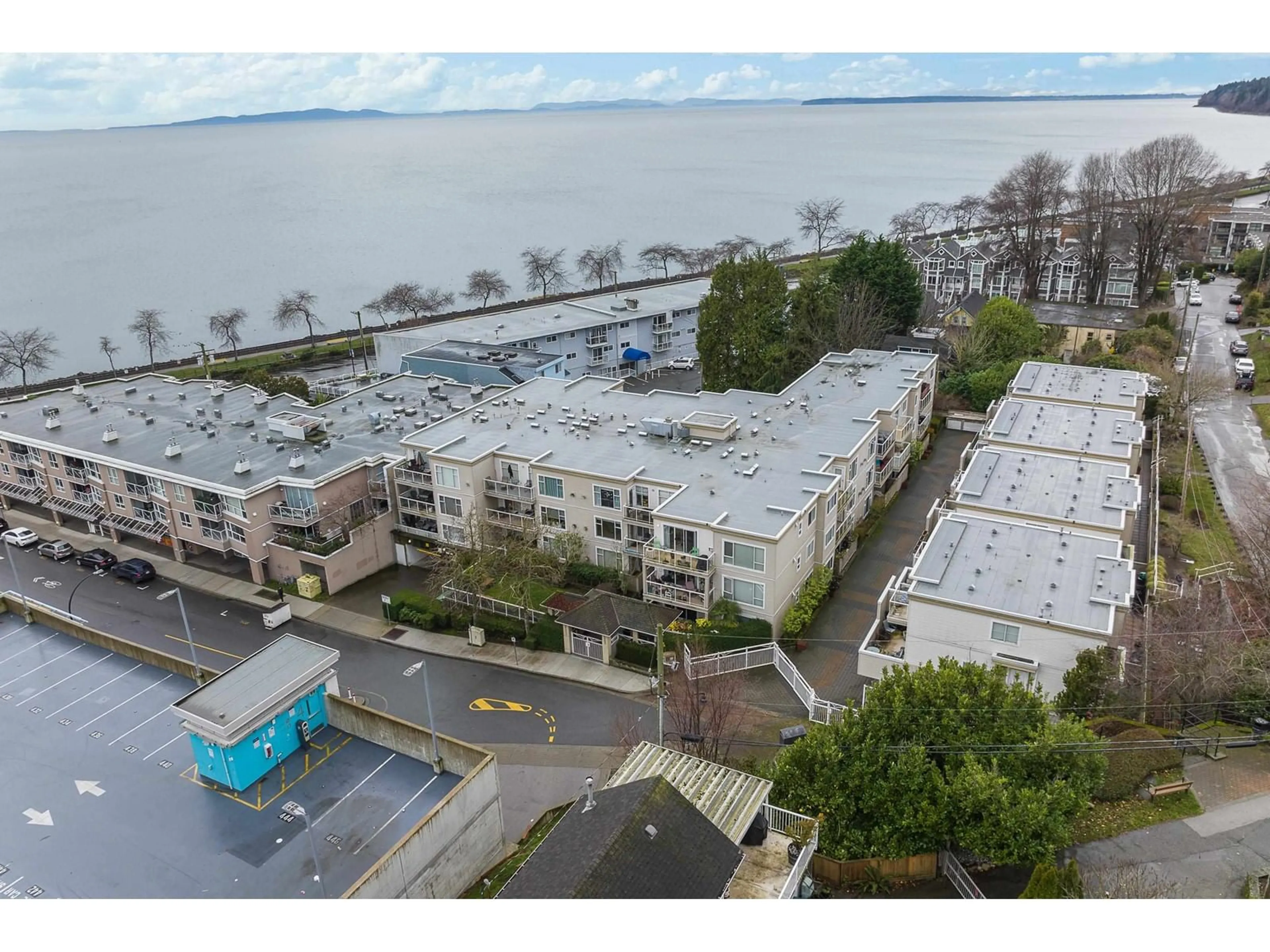 A pic from outside/outdoor area/front of a property/back of a property/a pic from drone, water/lake/river/ocean view for 201 1153 VIDAL STREET, White Rock British Columbia V4B3T4