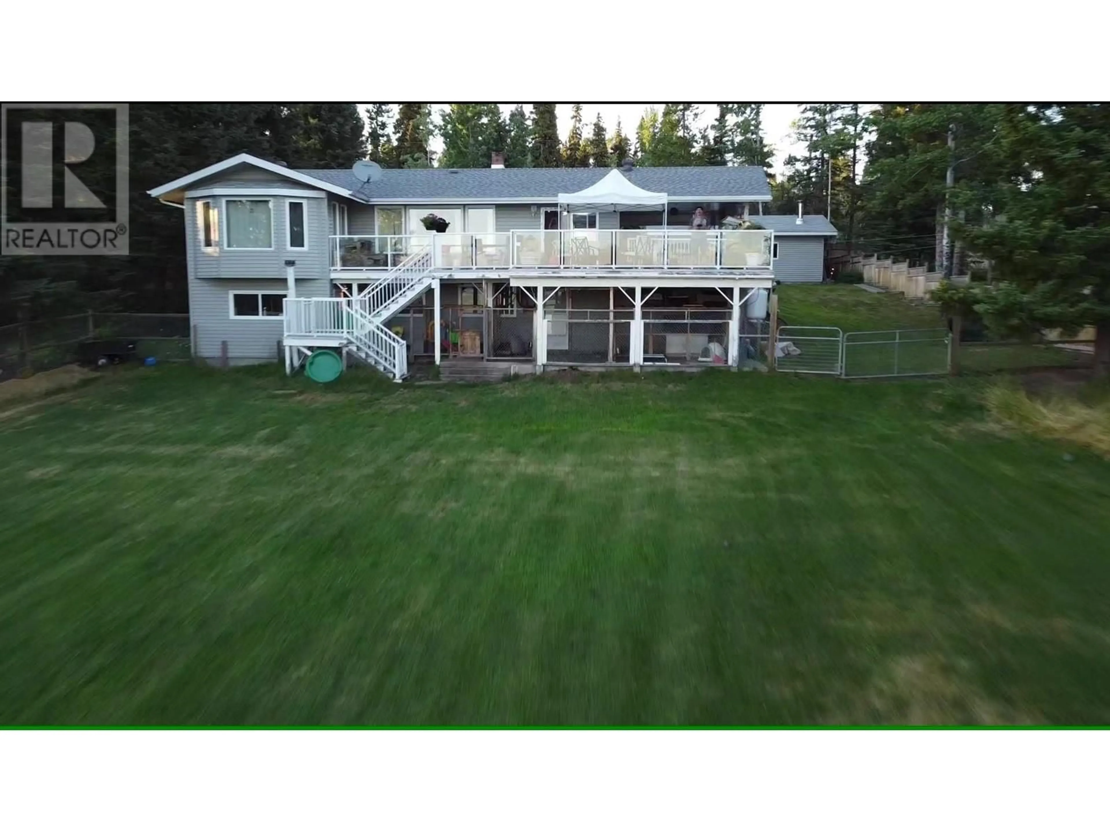 A pic from outside/outdoor area/front of a property/back of a property/a pic from drone, unknown for 3705 E TCHESINKUT LAKE ROAD, Burns Lake British Columbia V0J1E2