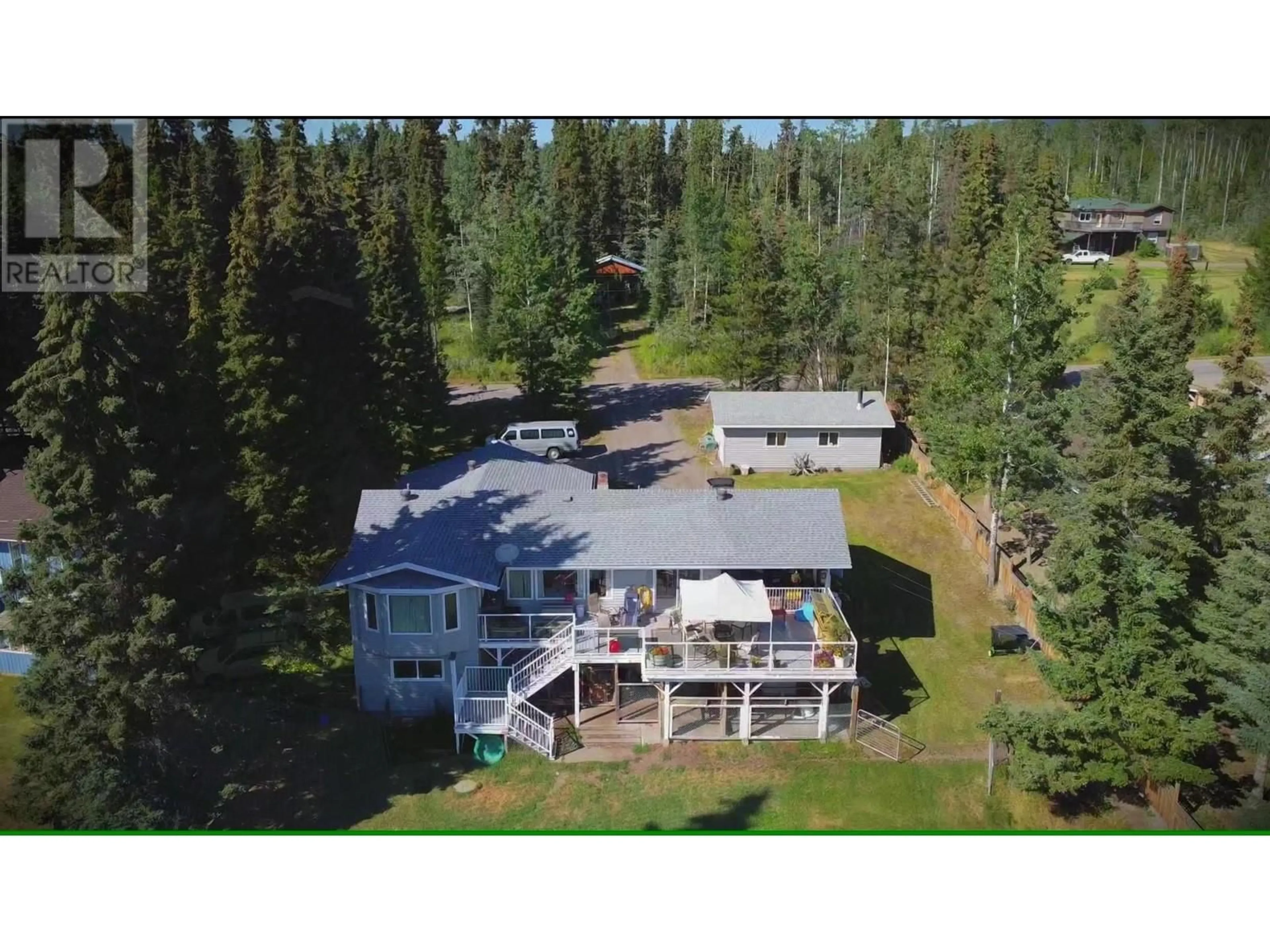 A pic from outside/outdoor area/front of a property/back of a property/a pic from drone, unknown for 3705 E TCHESINKUT LAKE ROAD, Burns Lake British Columbia V0J1E2