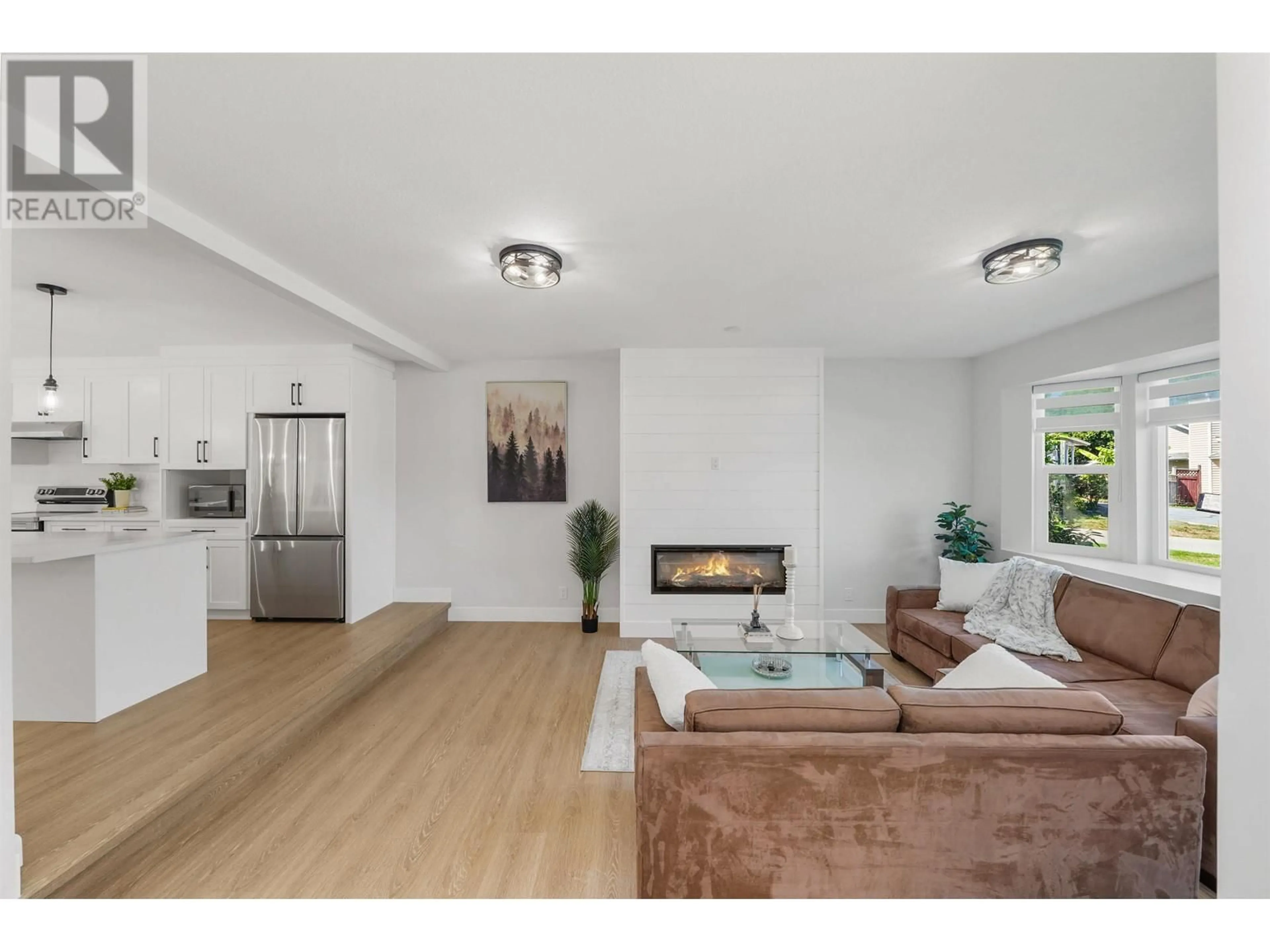 Living room with furniture, wood/laminate floor for 23005 APPLE GROVE, Maple Ridge British Columbia V2X9K3