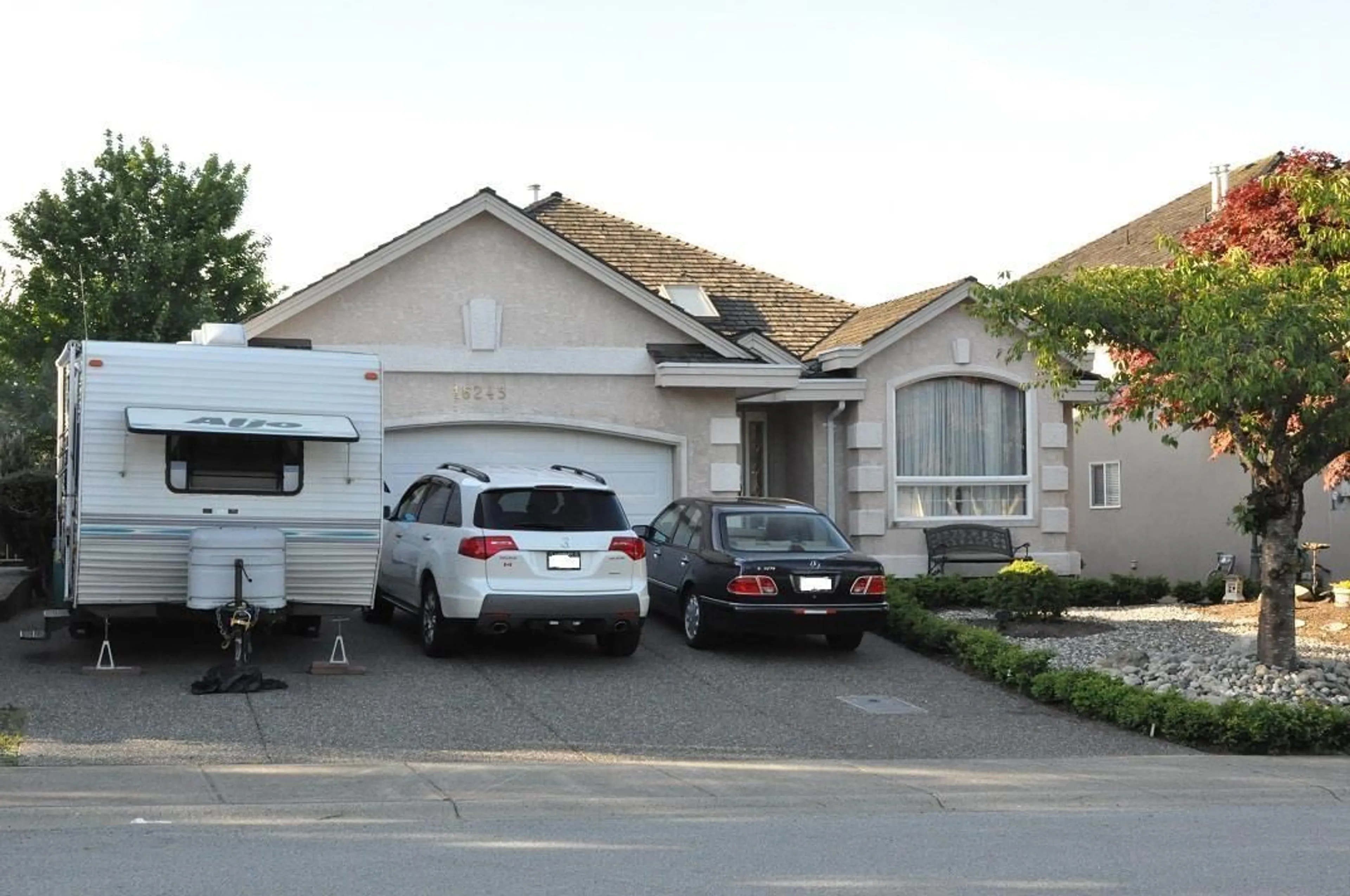 Home with vinyl exterior material, street for 16245 111A AVENUE, Surrey British Columbia V4N4R7