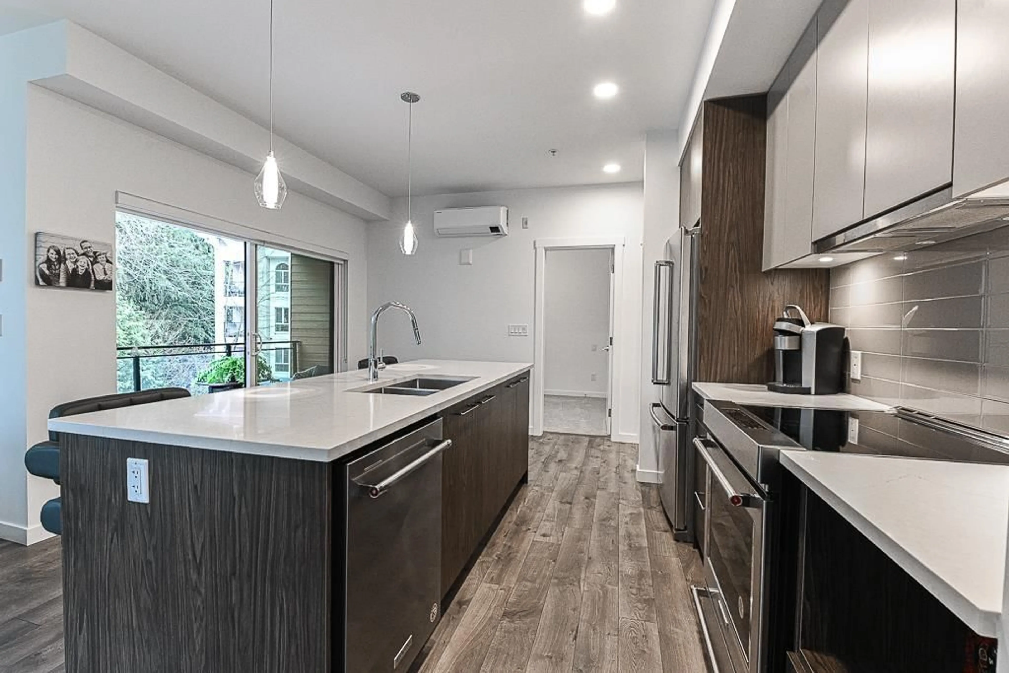 Open concept kitchen, unknown for 303 3182 GLADWIN ROAD, Abbotsford British Columbia V2T0K8