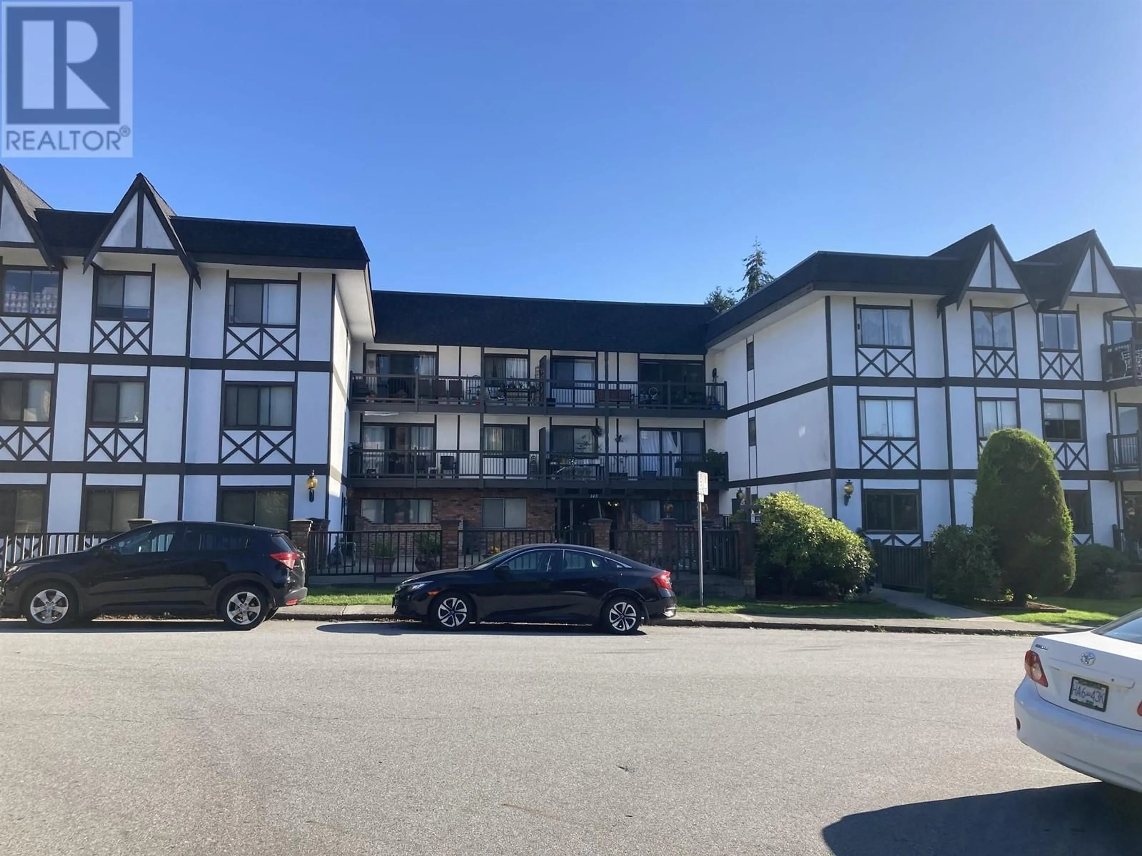 A pic from outside/outdoor area/front of a property/back of a property/a pic from drone, building for 103 145 W 18TH STREET, North Vancouver British Columbia V7M1W5