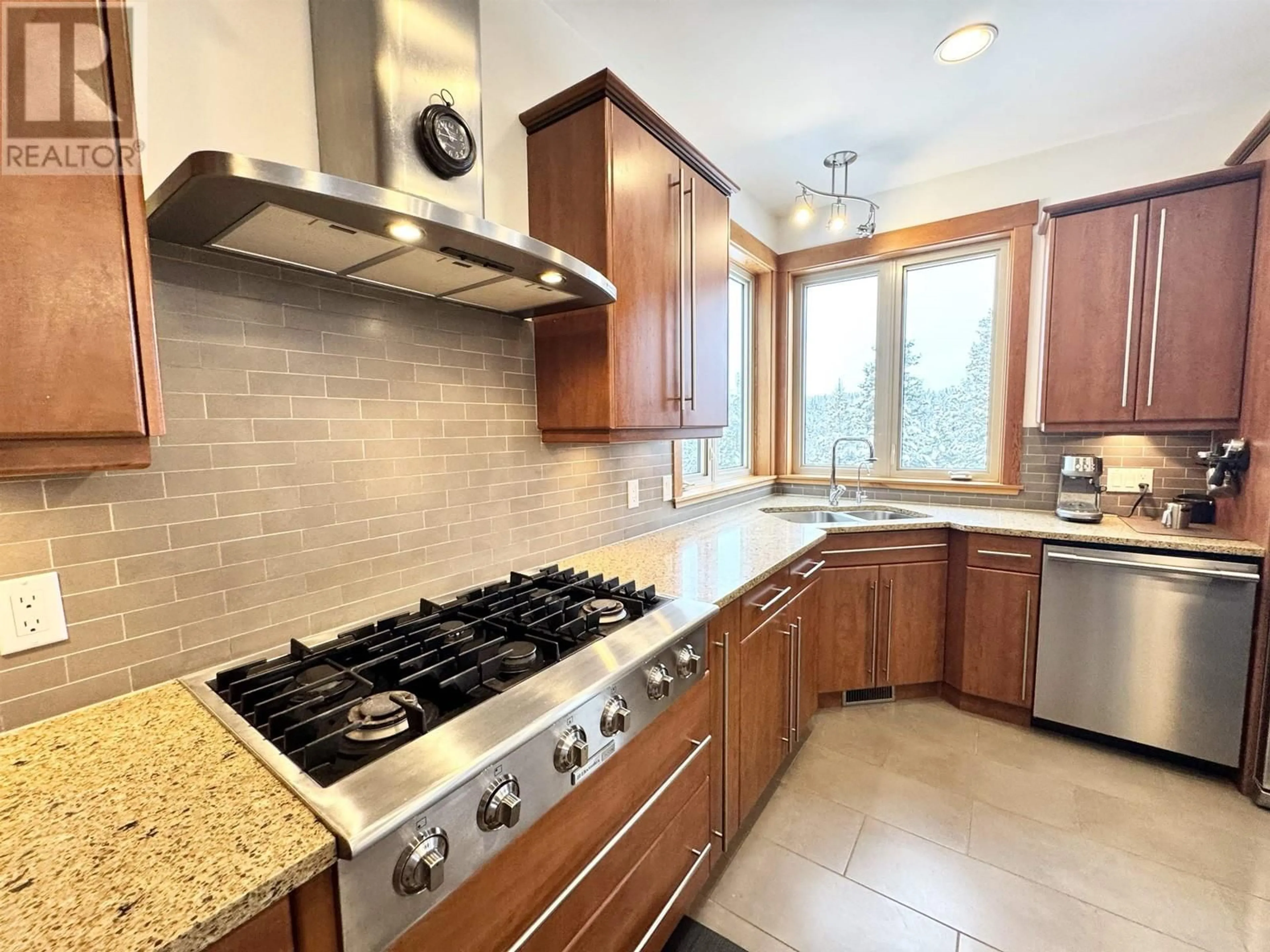 A pic from outside/outdoor area/front of a property/back of a property/a pic from drone, forest/trees view for 4872 GLOINNZUN CRESCENT, 108 Mile Ranch British Columbia V0K2Z0