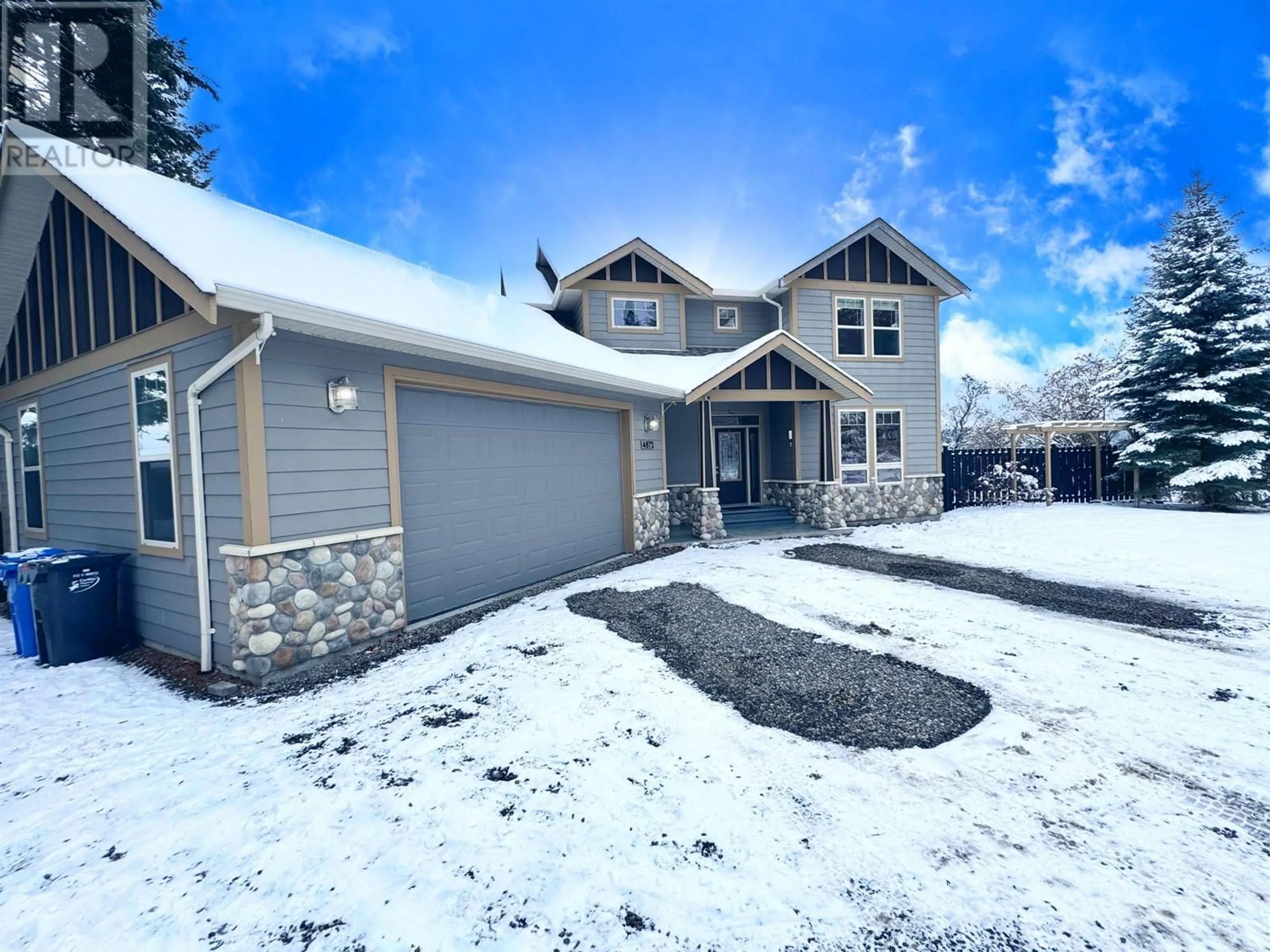 Home with vinyl exterior material, street for 4872 GLOINNZUN CRESCENT, 108 Mile Ranch British Columbia V0K2Z0