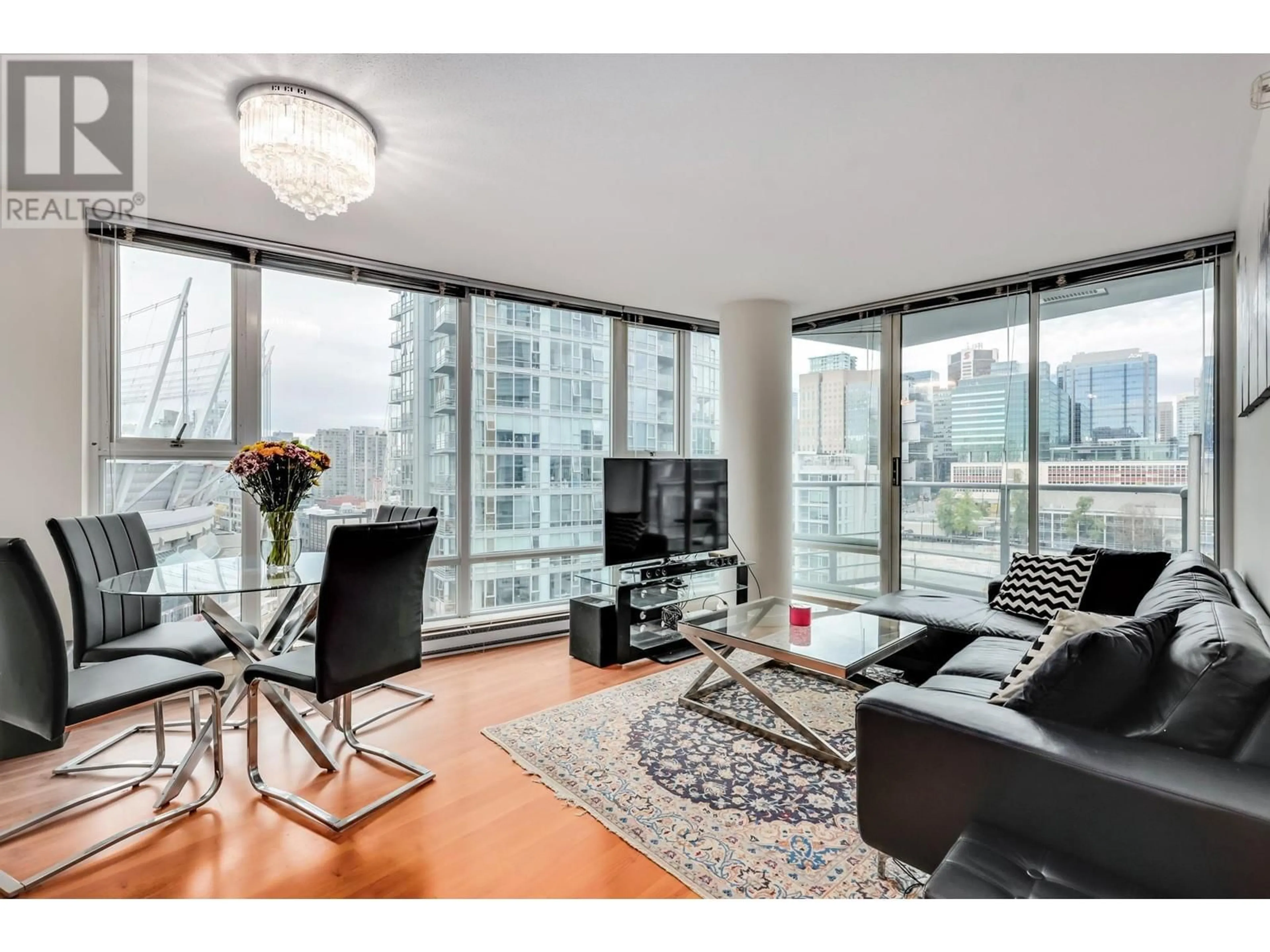 Living room with furniture, wood/laminate floor for 1208 131 REGIMENT SQUARE, Vancouver British Columbia V6B1X6