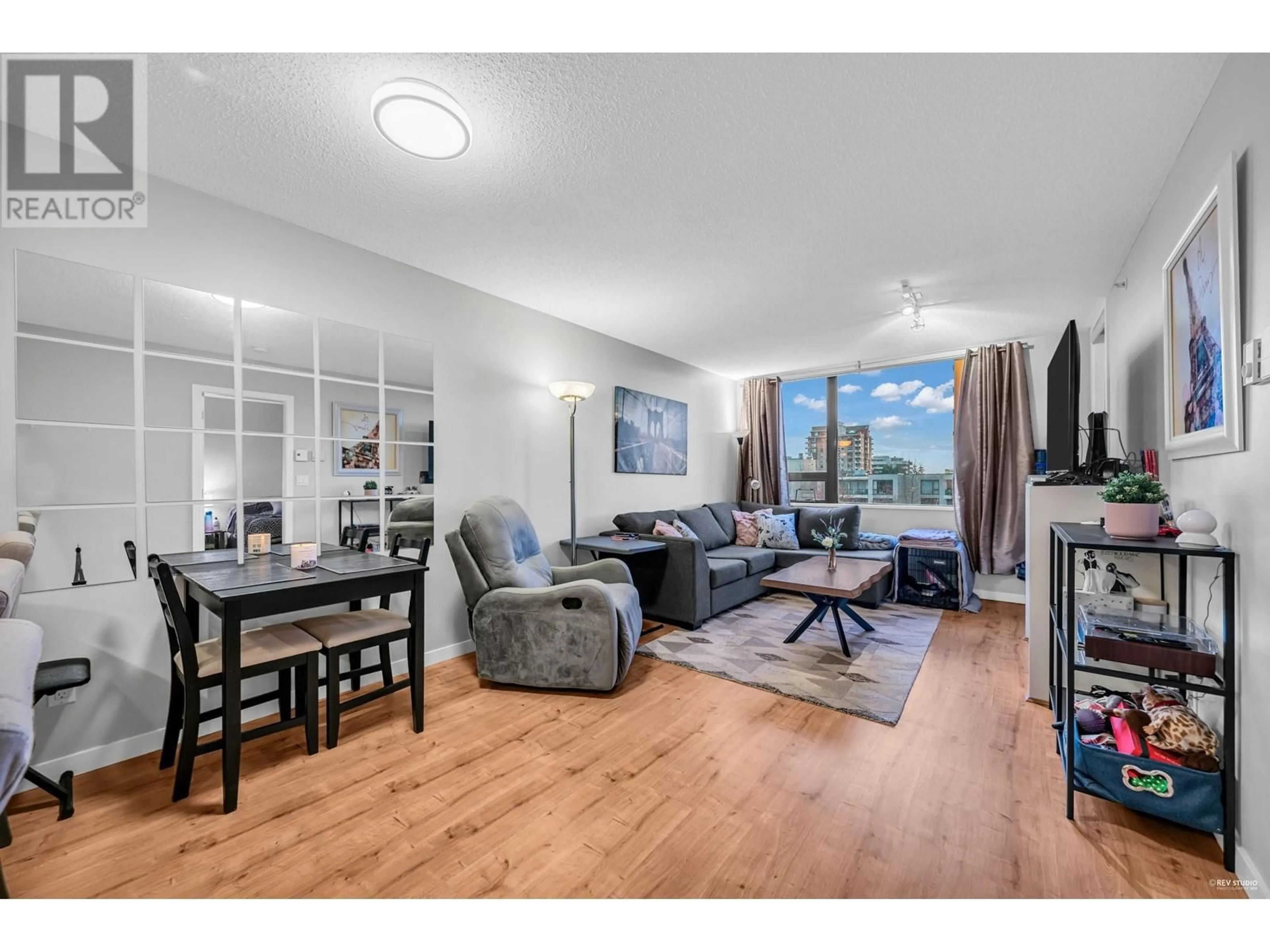 Living room with furniture, wood/laminate floor for 501 7108 COLLIER STREET, Burnaby British Columbia V5E0A1