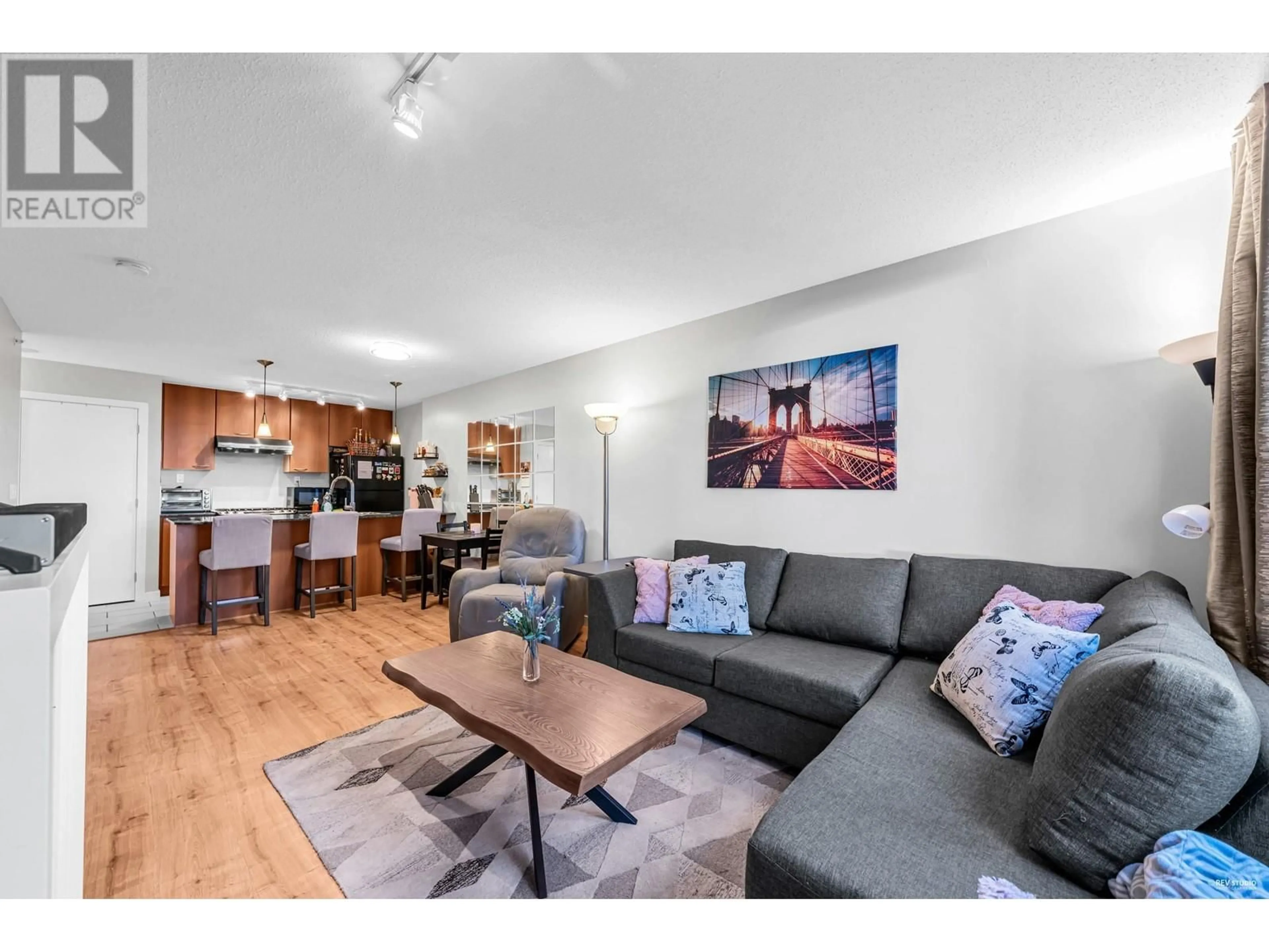 Living room with furniture, wood/laminate floor for 501 7108 COLLIER STREET, Burnaby British Columbia V5E0A1