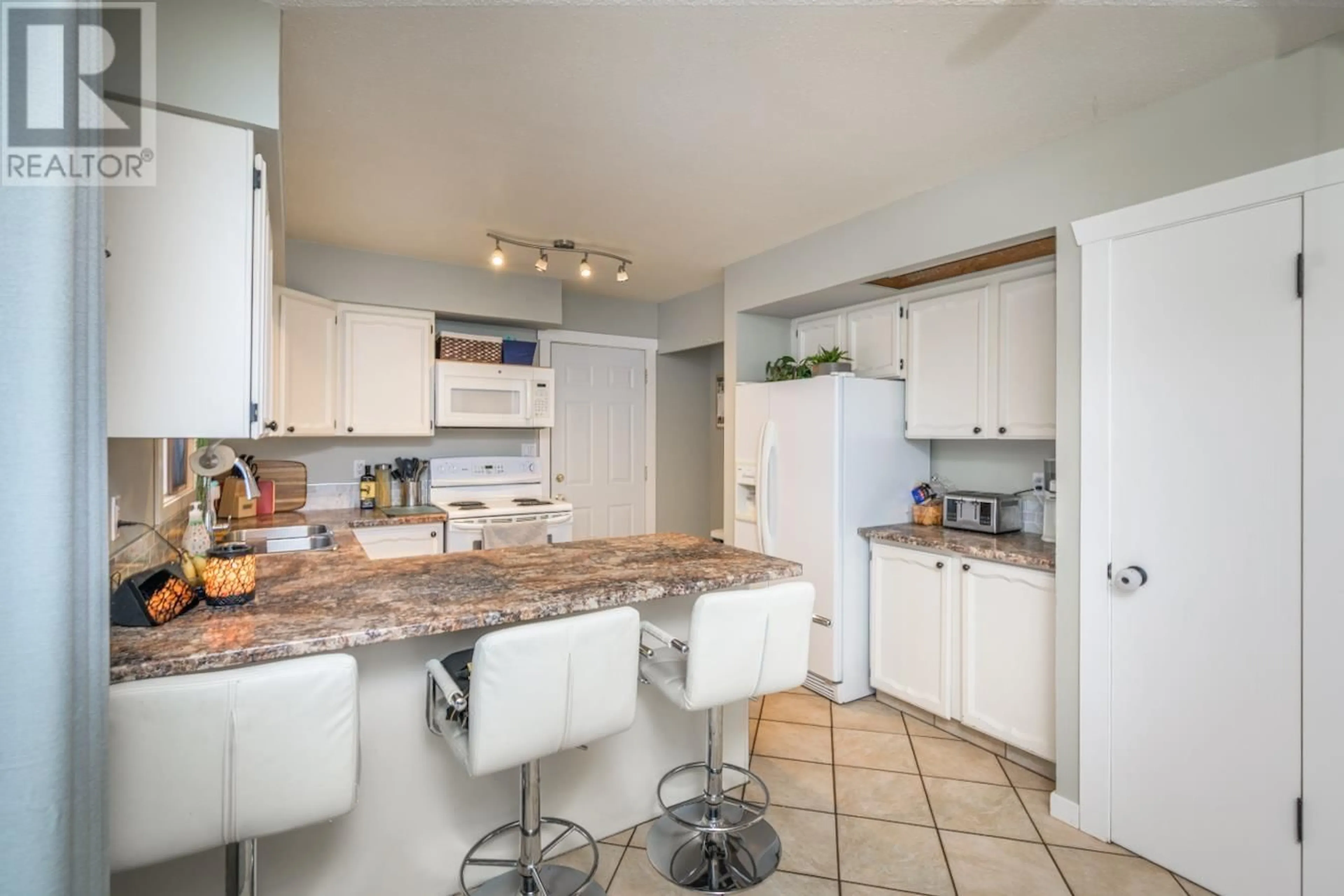 Open concept kitchen, ceramic/tile floor for 3116 WALLACE CRESCENT, Prince George British Columbia V2K3V3