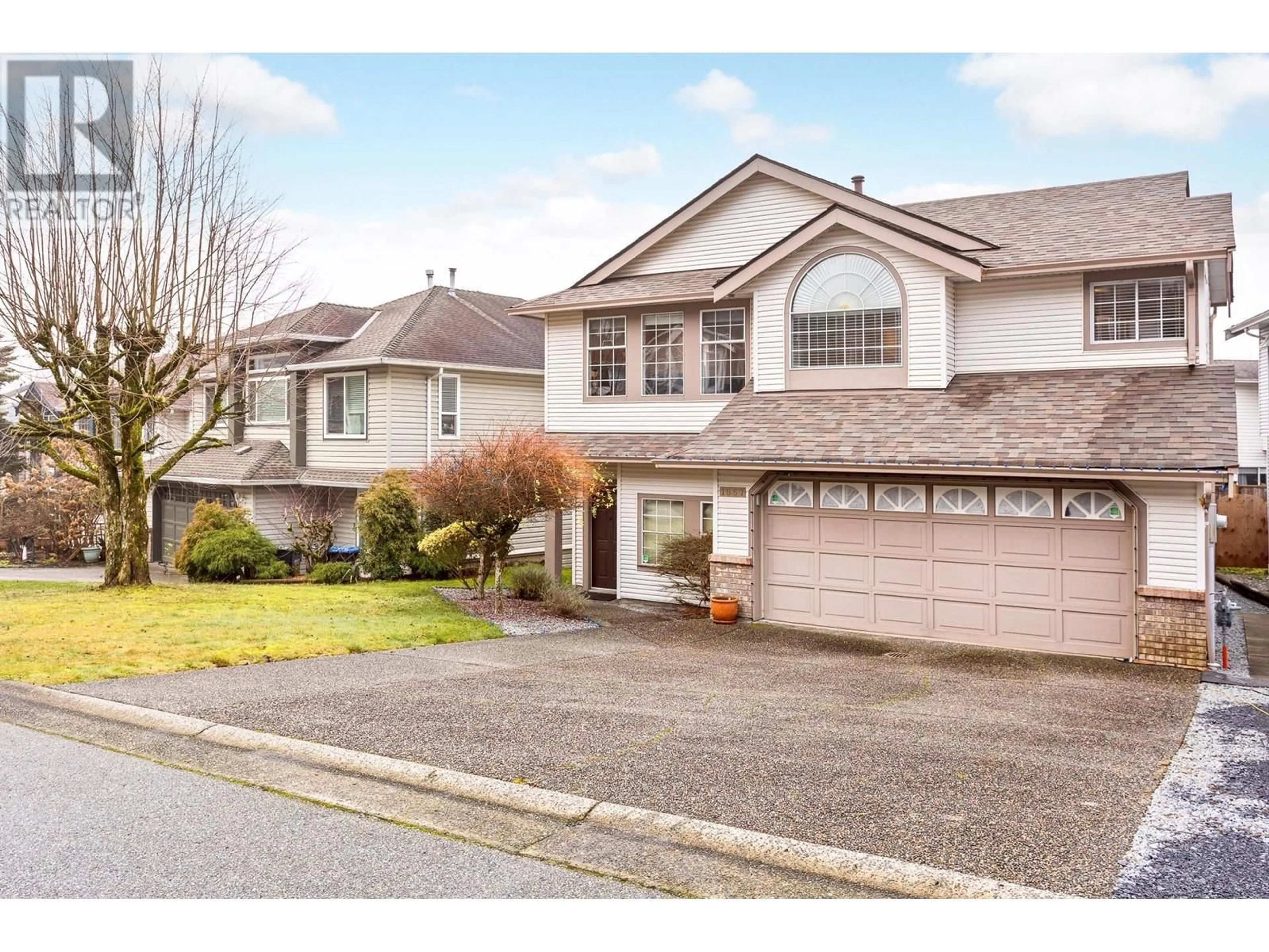 Home with vinyl exterior material, street for 1667 MCPHERSON DRIVE, Port Coquitlam British Columbia V3C6C9