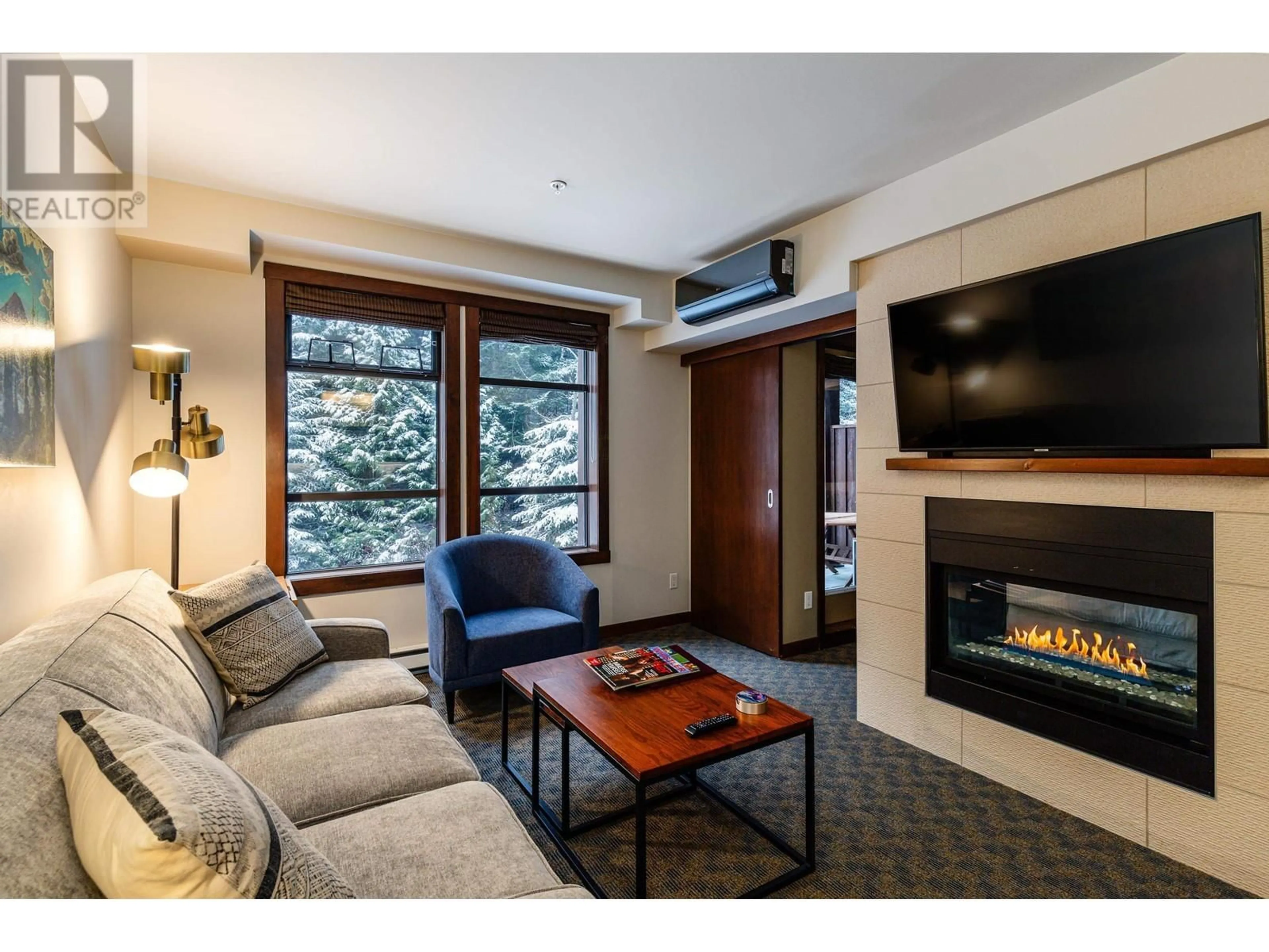 Living room with furniture, unknown for 107 2020 LONDON LANE, Whistler British Columbia V8E0B6