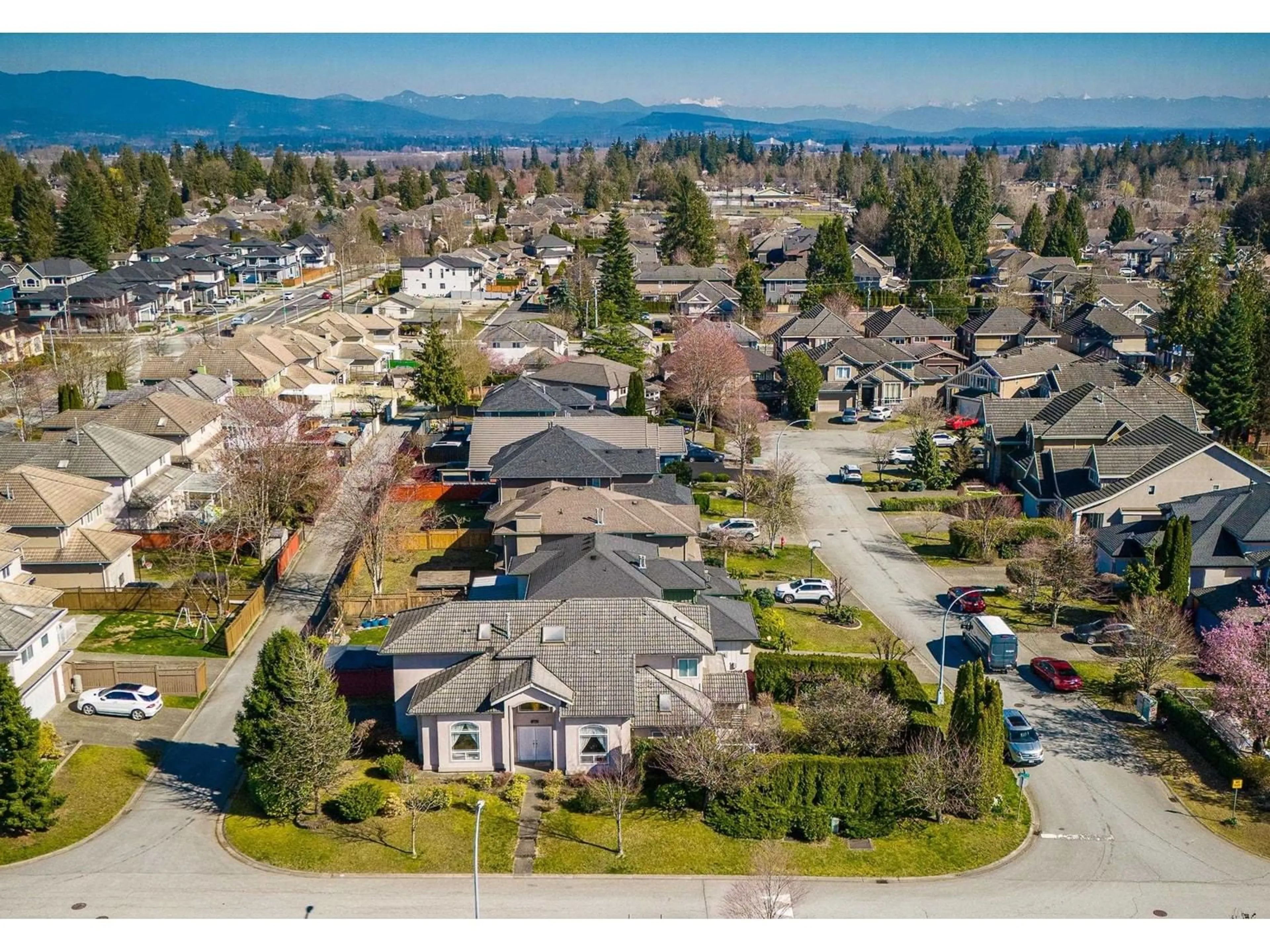 A pic from outside/outdoor area/front of a property/back of a property/a pic from drone, mountain view for 10970 155 STREET, Surrey British Columbia V3R0X6