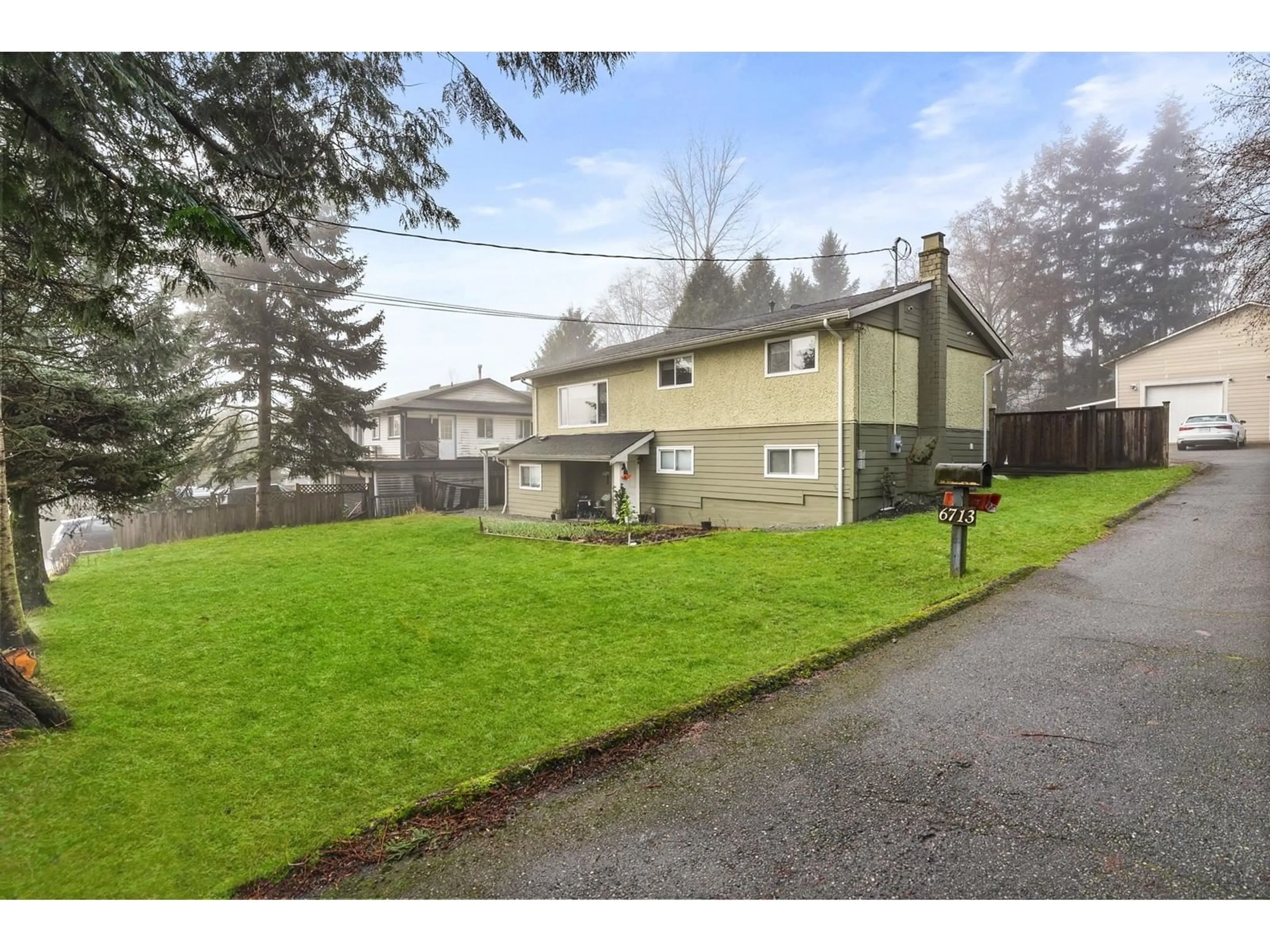 A pic from outside/outdoor area/front of a property/back of a property/a pic from drone, street for 6713 140 STREET, Surrey British Columbia V3W5J3