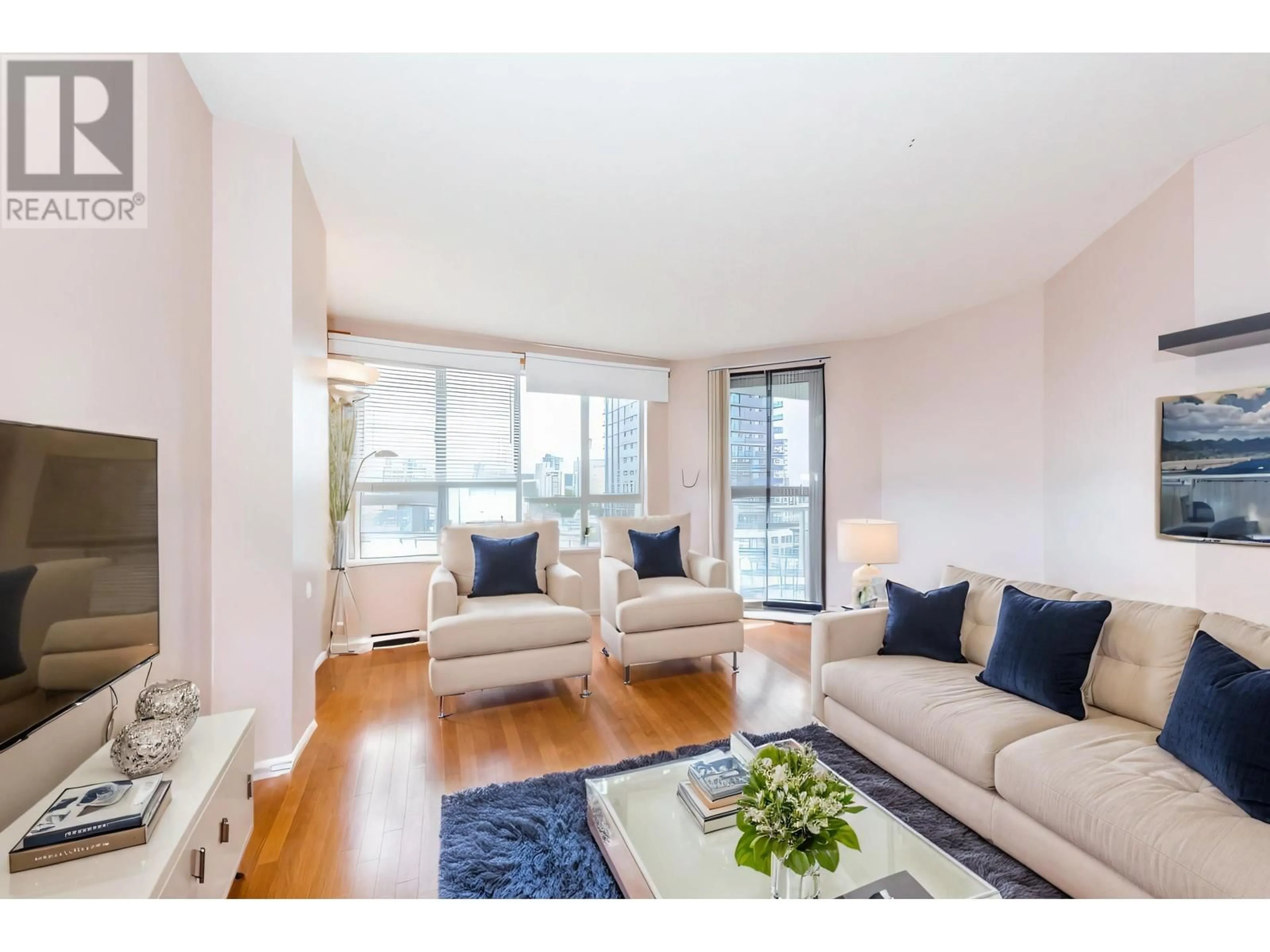 Living room with furniture, wood/laminate floor for 910 3489 ASCOT PLACE, Vancouver British Columbia V5R6B6