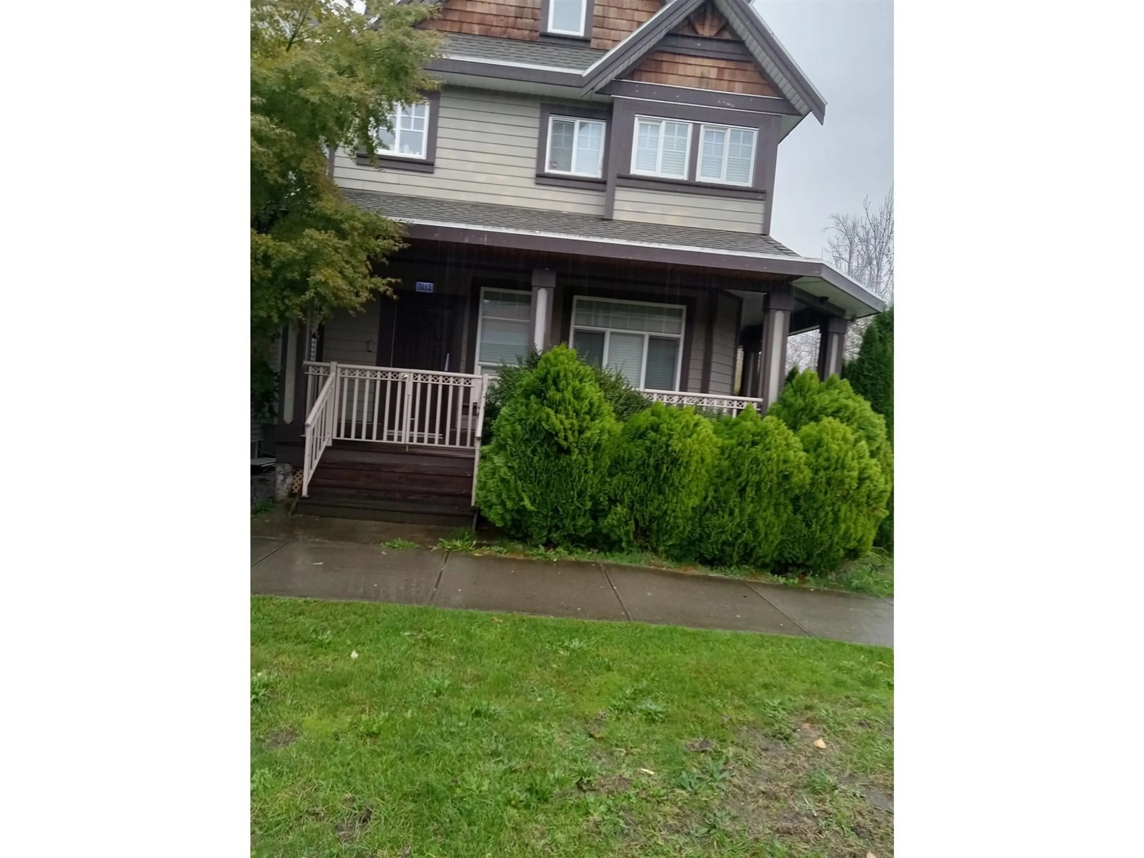 A pic from outside/outdoor area/front of a property/back of a property/a pic from drone, street for 7052 148 STREET, Surrey British Columbia V3S2X3