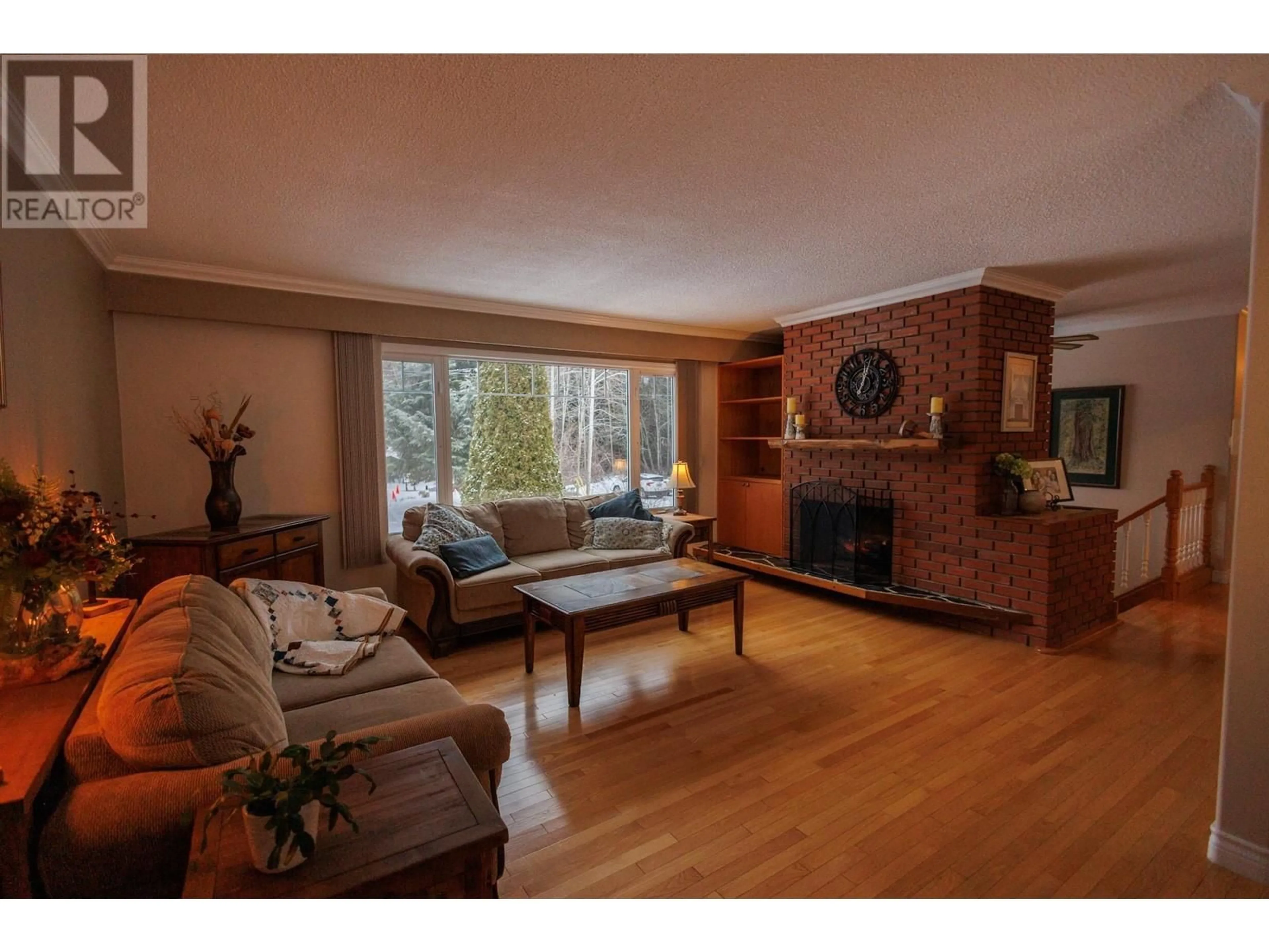 Living room with furniture, wood/laminate floor for 4607 MUNTHE STREET, Terrace British Columbia V8G2H5