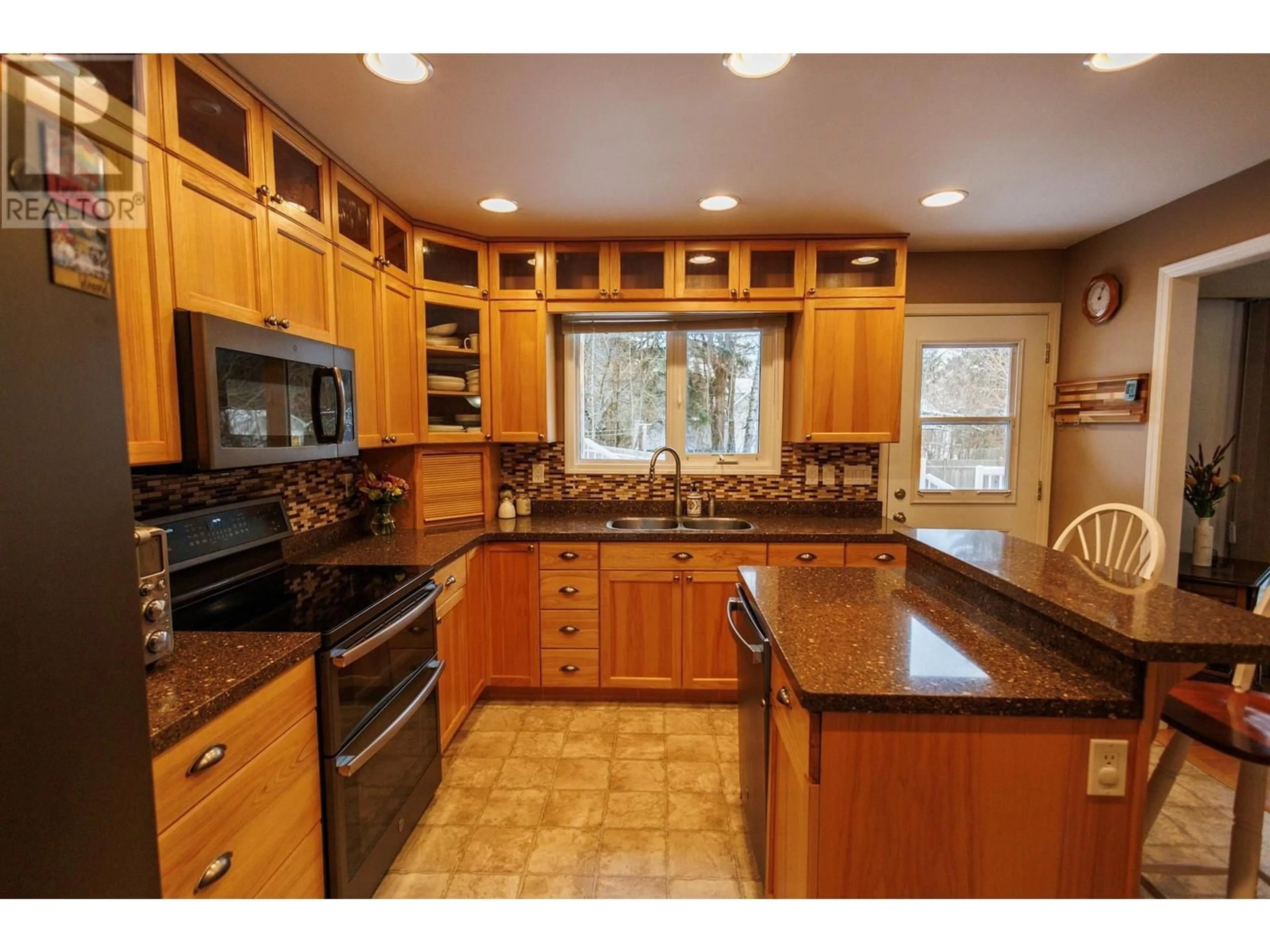 Standard kitchen, ceramic/tile floor for 4607 MUNTHE STREET, Terrace British Columbia V8G2H5