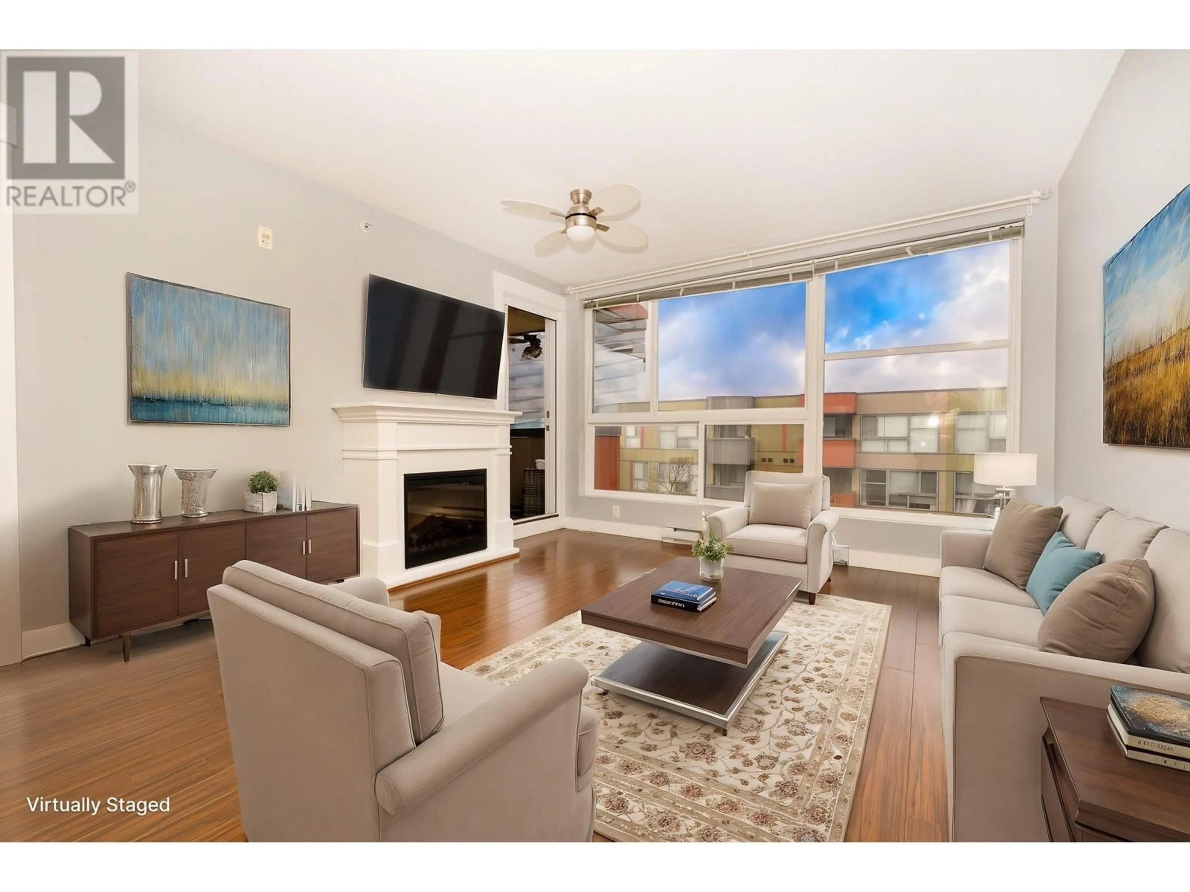 Living room with furniture, wood/laminate floor for 410 12075 228TH STREET, Maple Ridge British Columbia V2X6M2