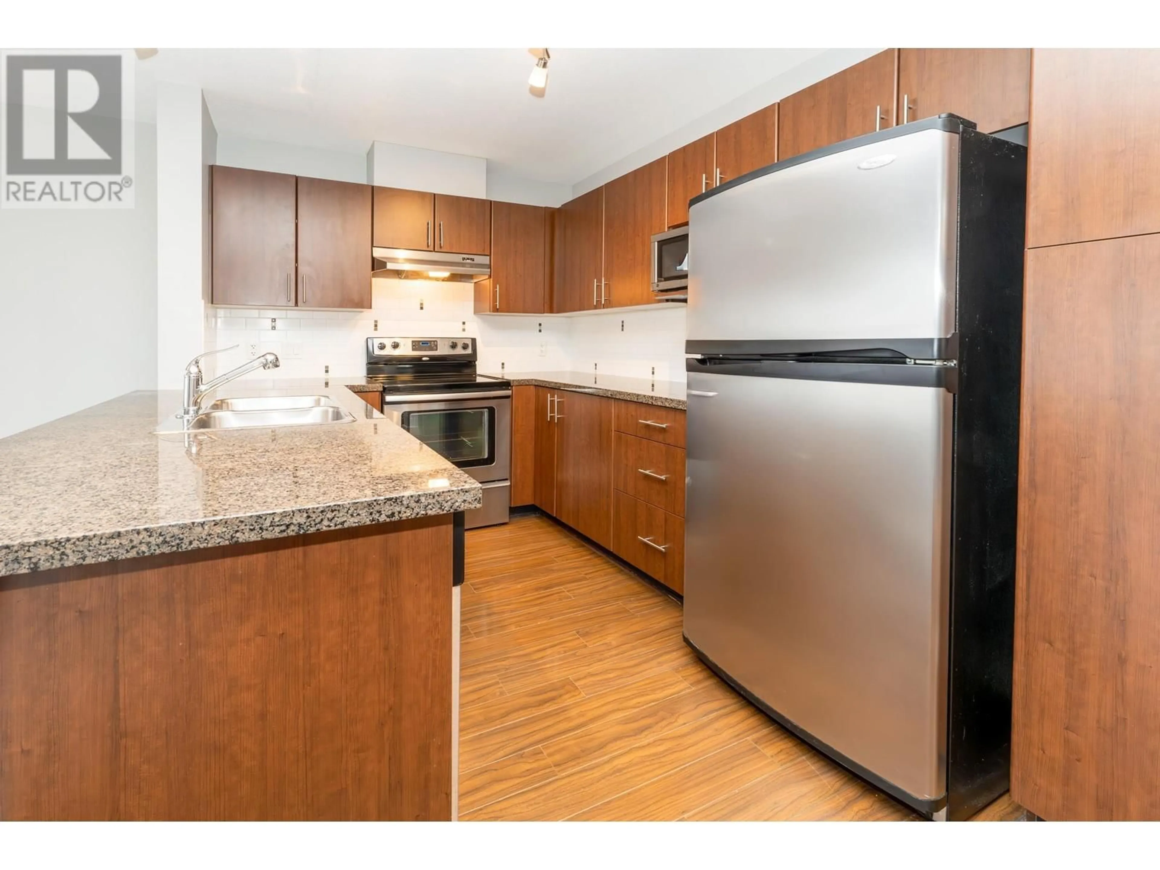 Standard kitchen, wood/laminate floor for 410 12075 228TH STREET, Maple Ridge British Columbia V2X6M2