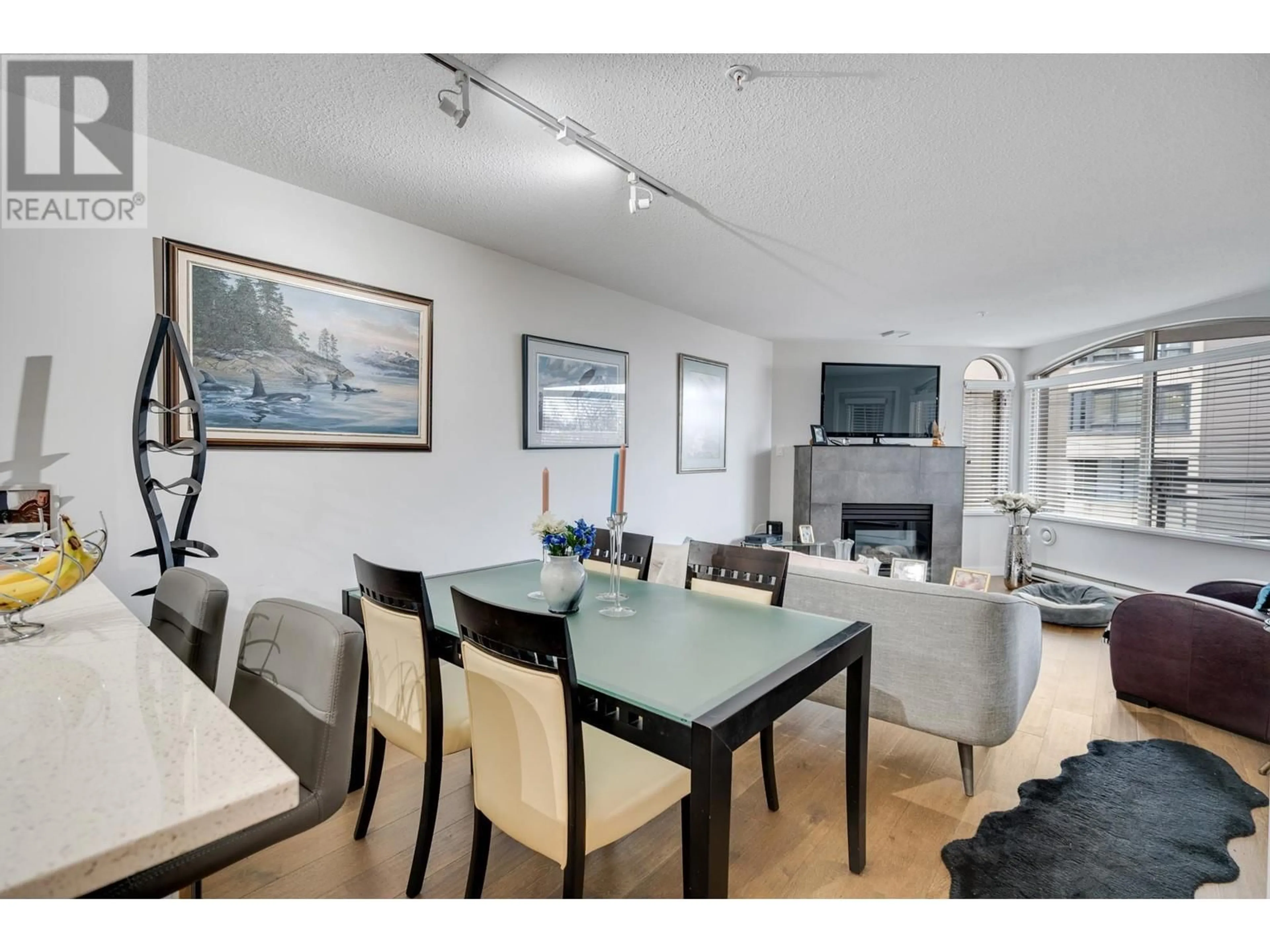 Dining room, wood/laminate floor for 206 1208 BIDWELL STREET, Vancouver British Columbia V6G2K9