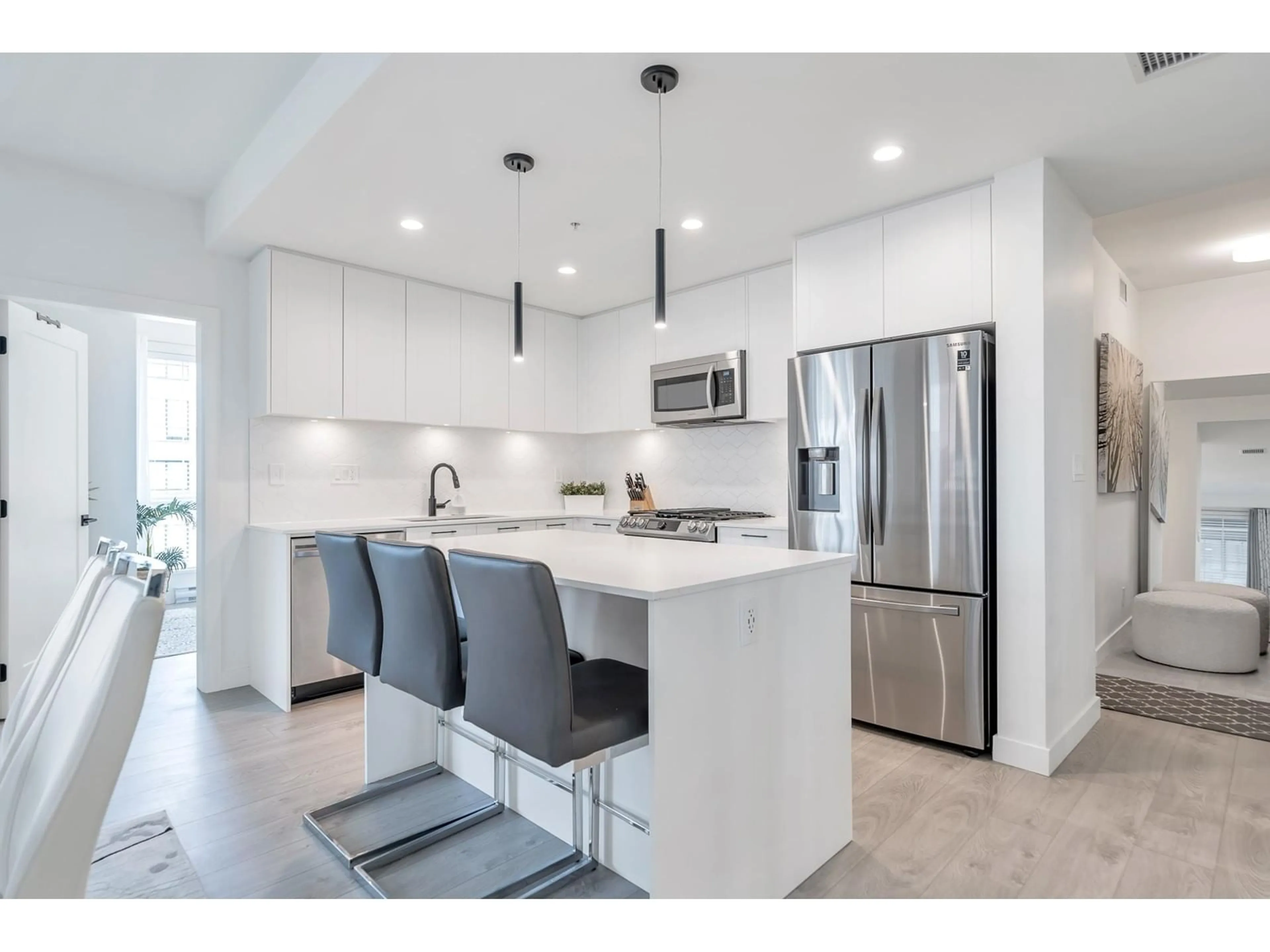 Open concept kitchen, ceramic/tile floor for 210 8327 201 STREET, Langley British Columbia V2Y3P5