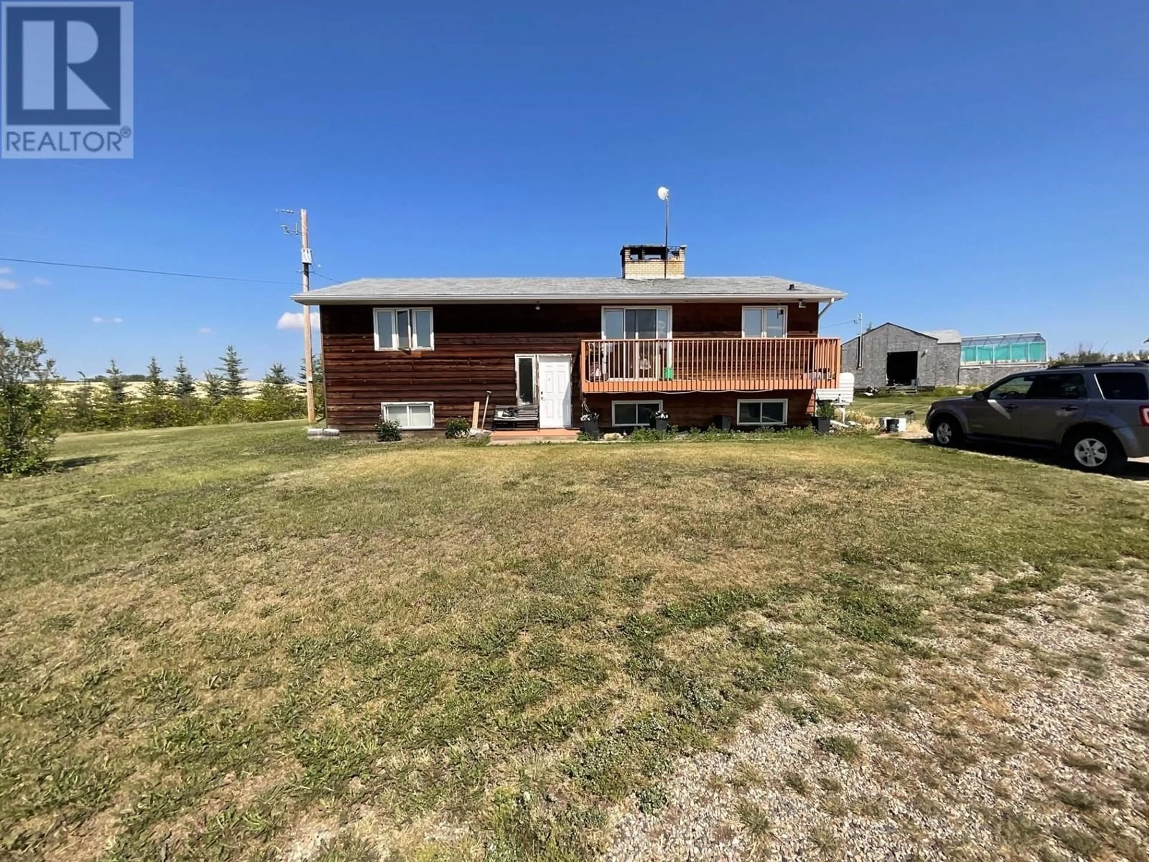 A pic from outside/outdoor area/front of a property/back of a property/a pic from drone, building for 13518 MONTNEY ROAD, Fort St. John British Columbia V1J8E1