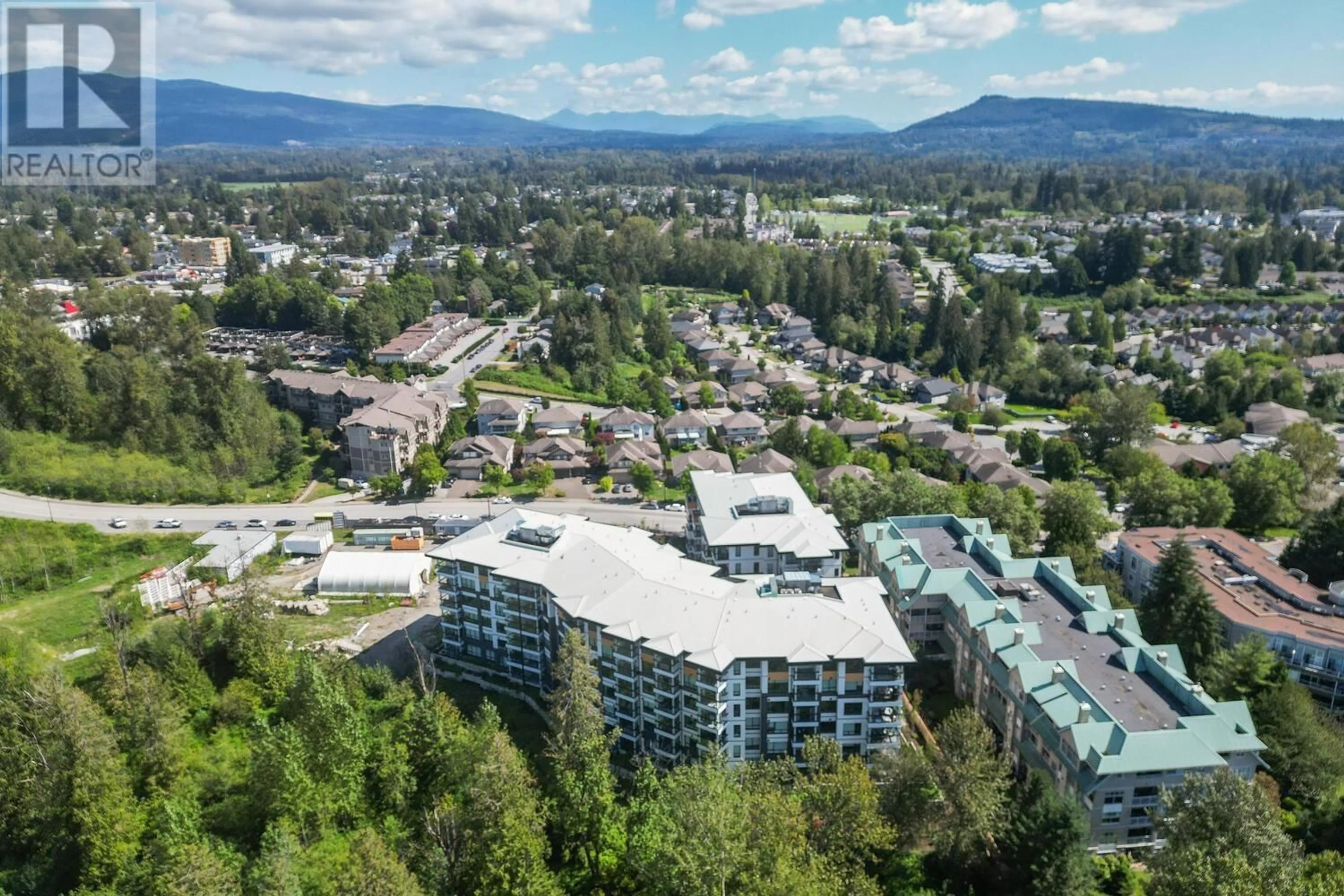 A pic from outside/outdoor area/front of a property/back of a property/a pic from drone, mountain view for 310 11641 227 STREET, Maple Ridge British Columbia V2X9J6