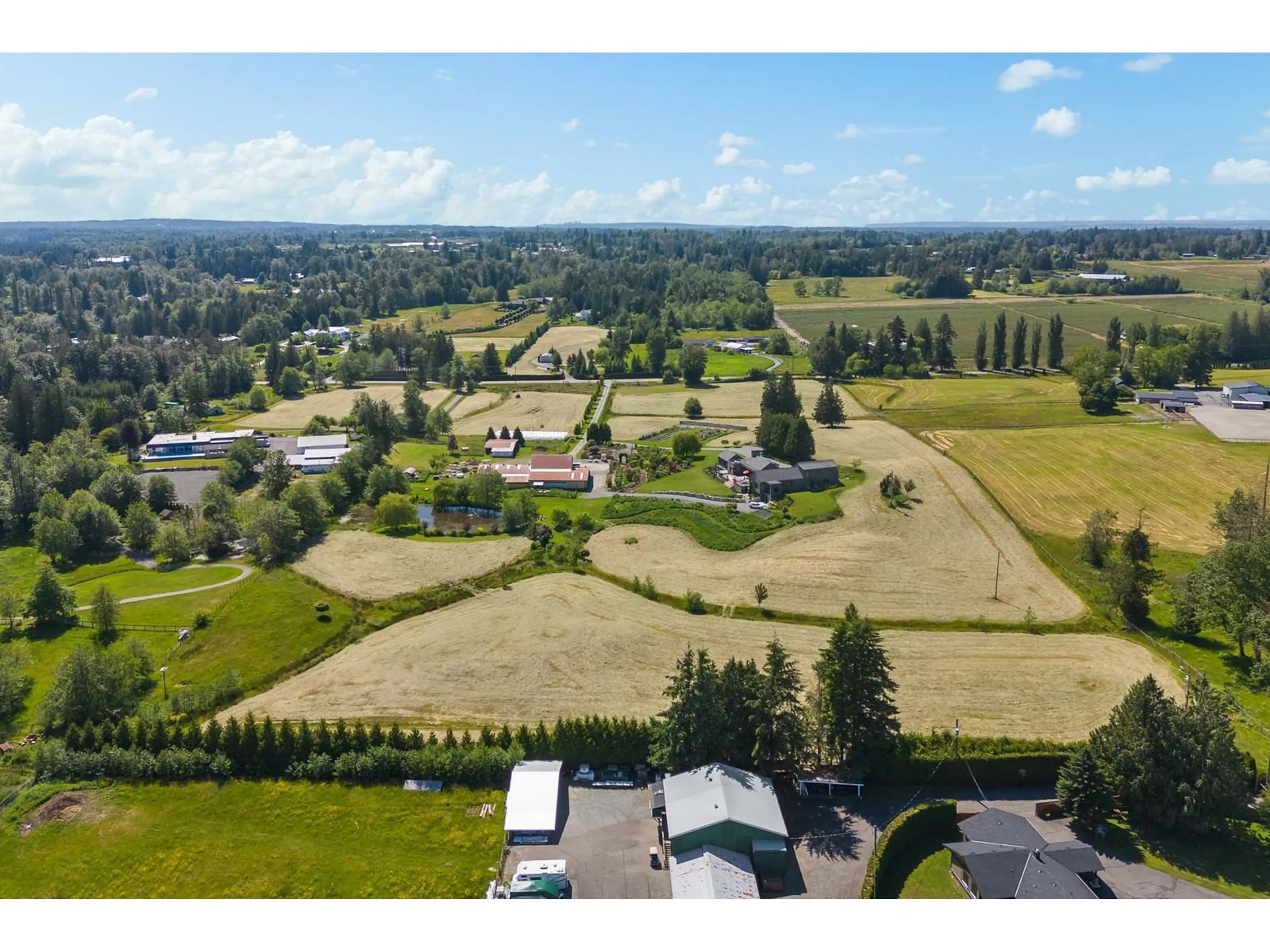 A pic from outside/outdoor area/front of a property/back of a property/a pic from drone, mountain view for 2768 256 STREET, Langley British Columbia V4W1Y4