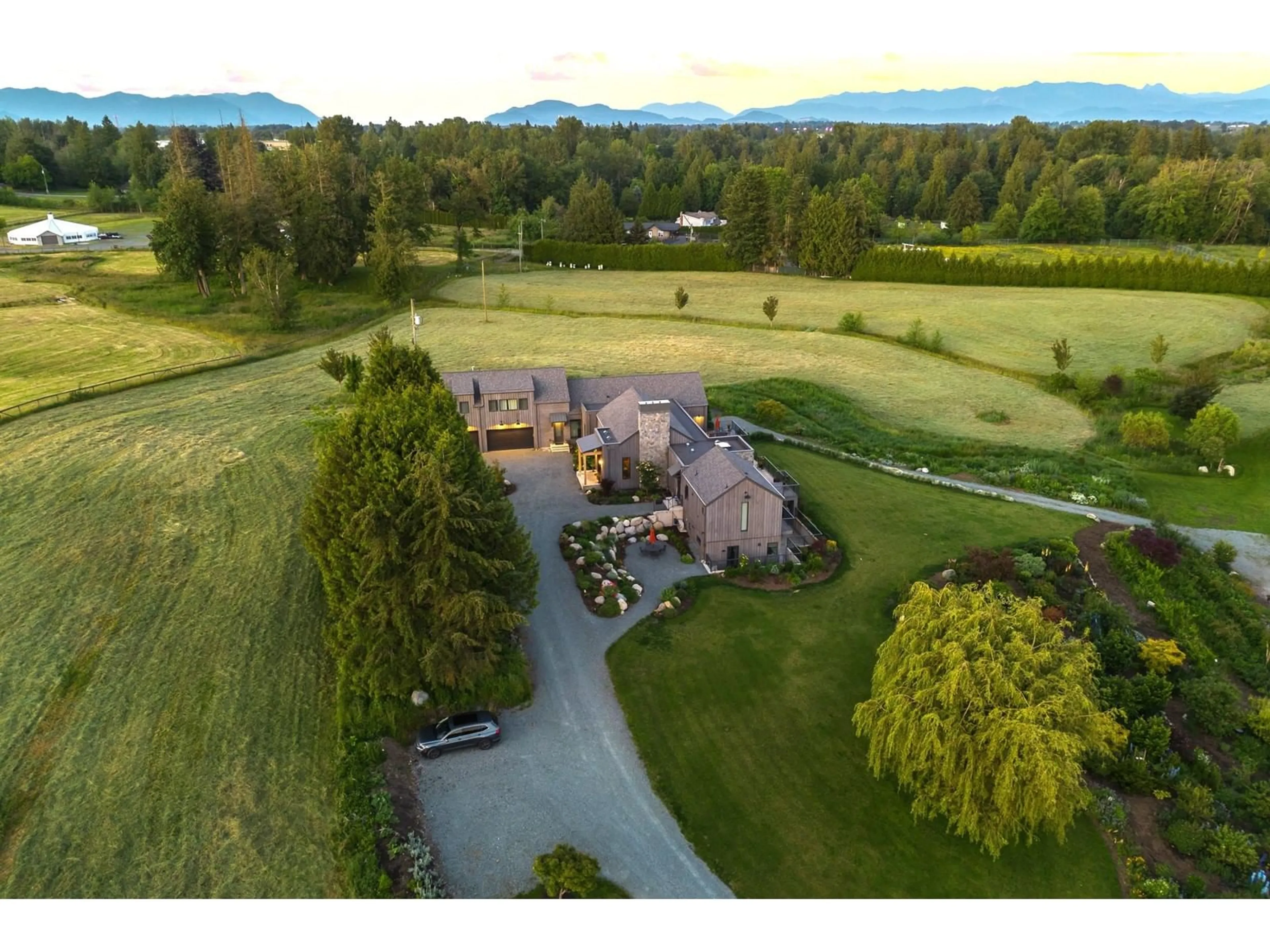 A pic from outside/outdoor area/front of a property/back of a property/a pic from drone, mountain view for 2768 256 STREET, Langley British Columbia V4W1Y4