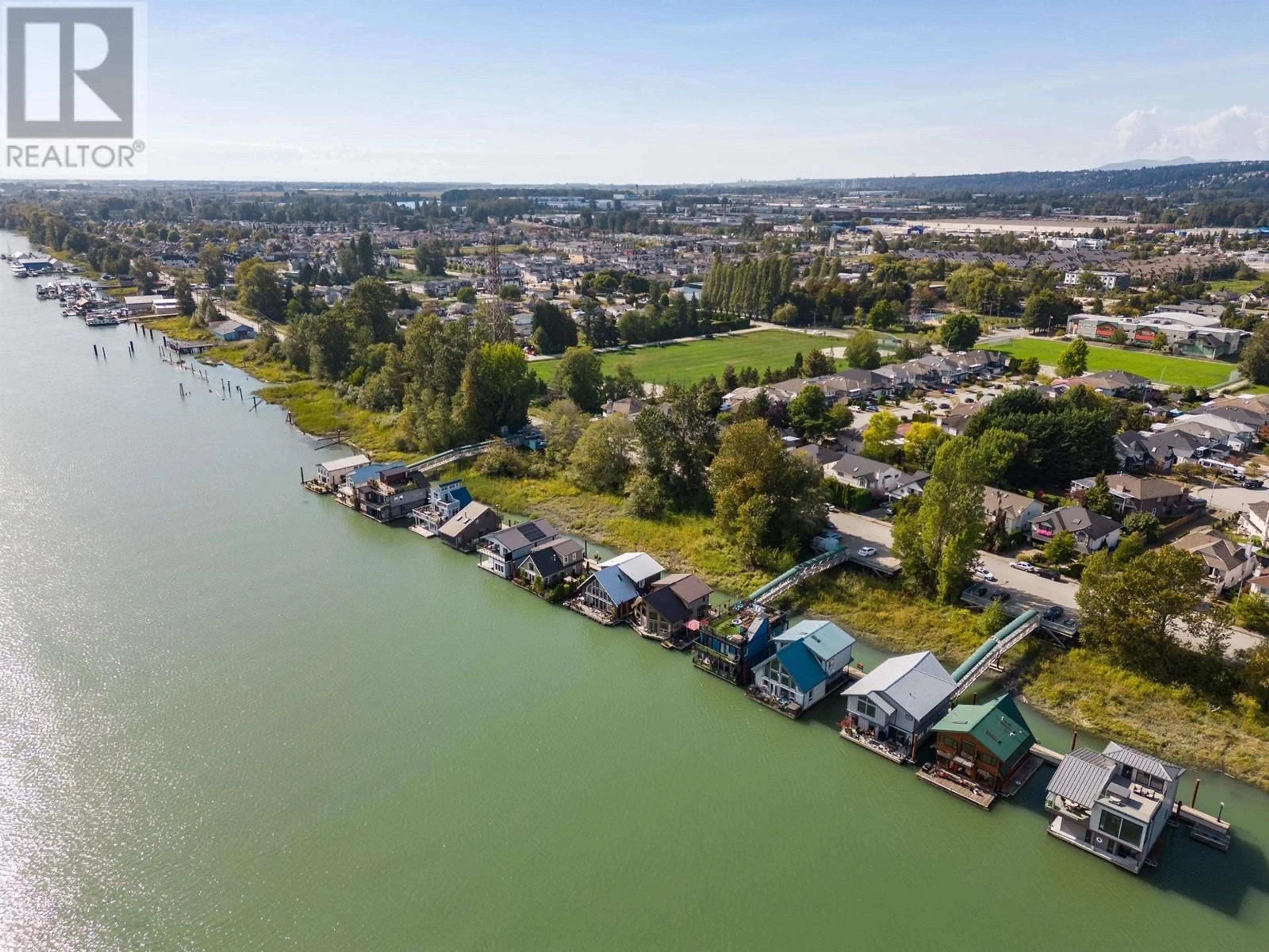 A pic from outside/outdoor area/front of a property/back of a property/a pic from drone, water/lake/river/ocean view for 4 800 SOUTH DYKE ROAD, New Westminster British Columbia V3M4Z8