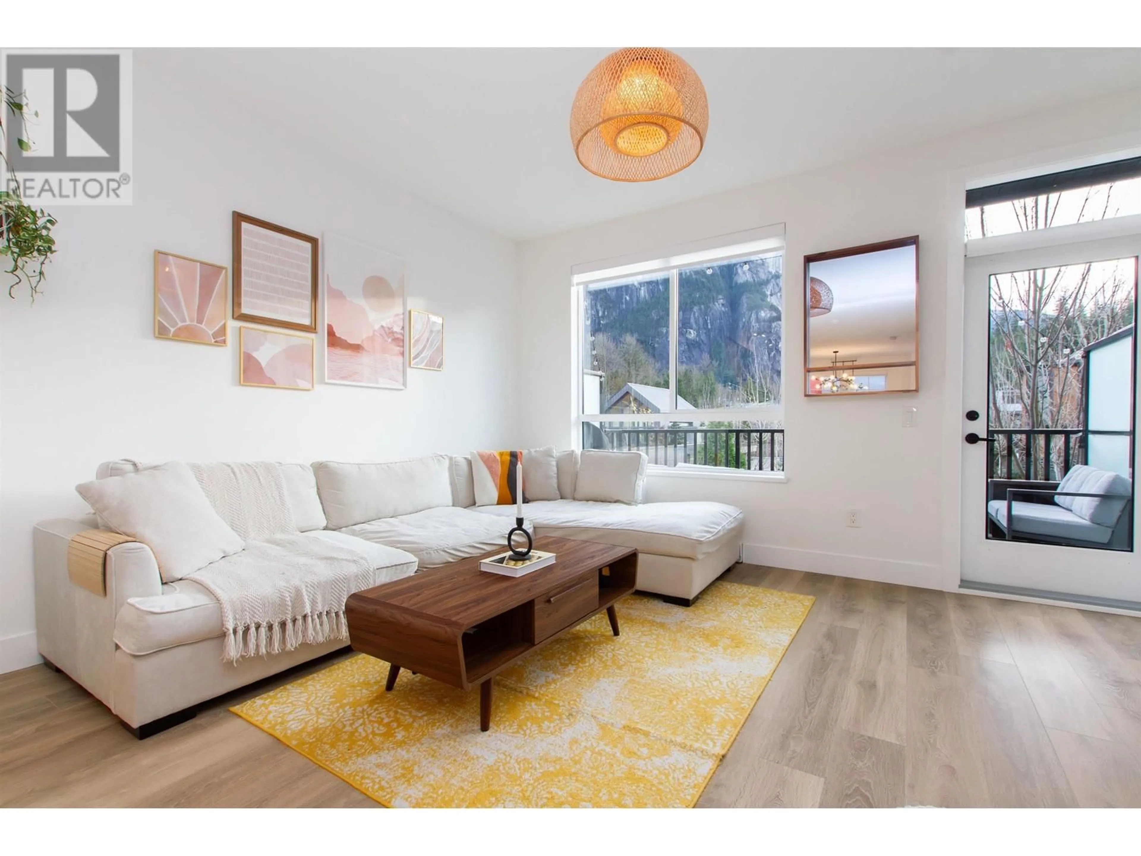 Living room with furniture, wood/laminate floor for 1367 VALLEYSIDE PLACE, Squamish British Columbia V8B1A8