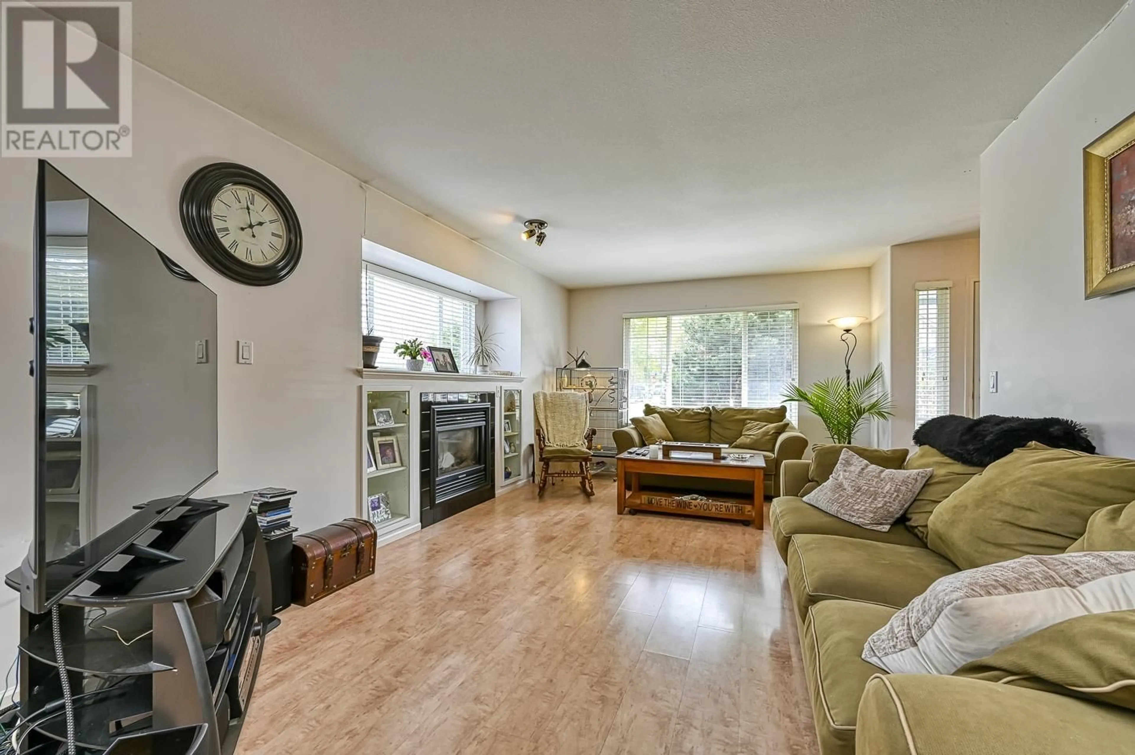 Living room with furniture, unknown for 711 RIVERSIDE DRIVE, Port Coquitlam British Columbia V3B7T7