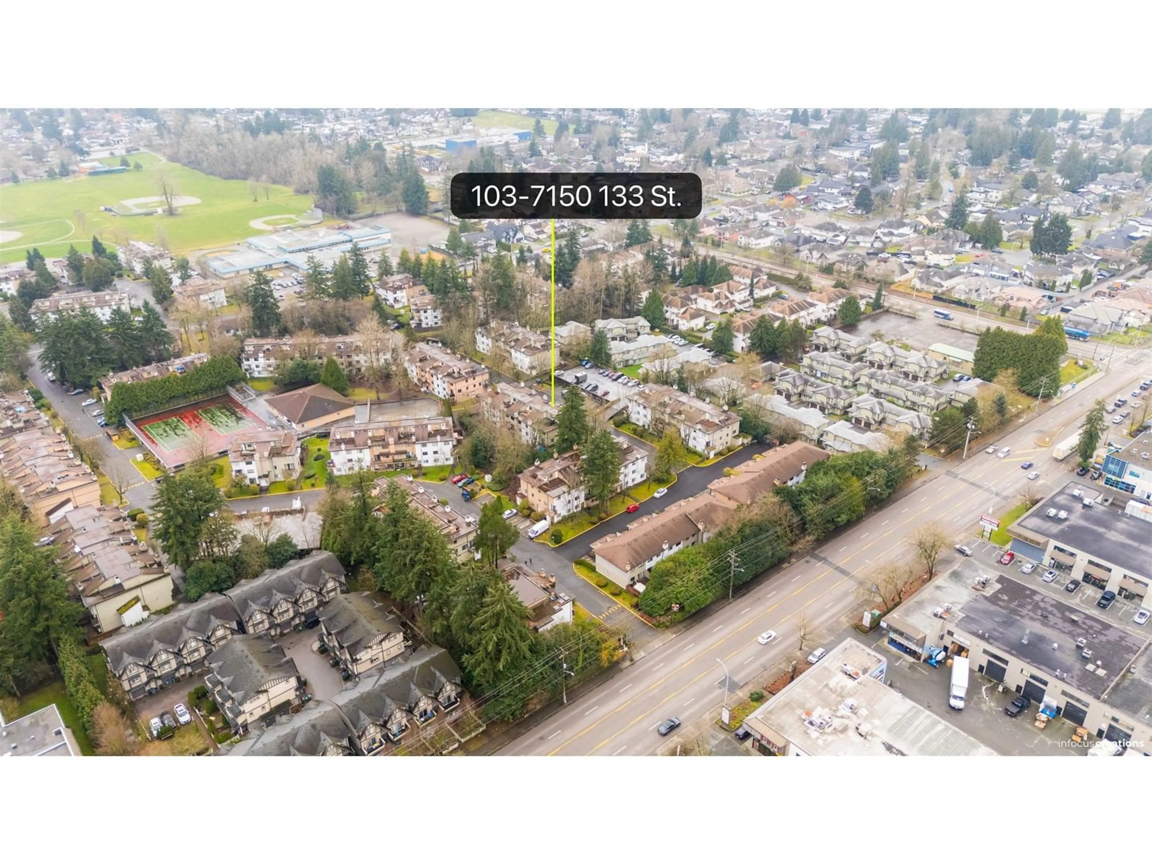 A pic from outside/outdoor area/front of a property/back of a property/a pic from drone, street for 103 7150 133 STREET, Surrey British Columbia V3W7Z7