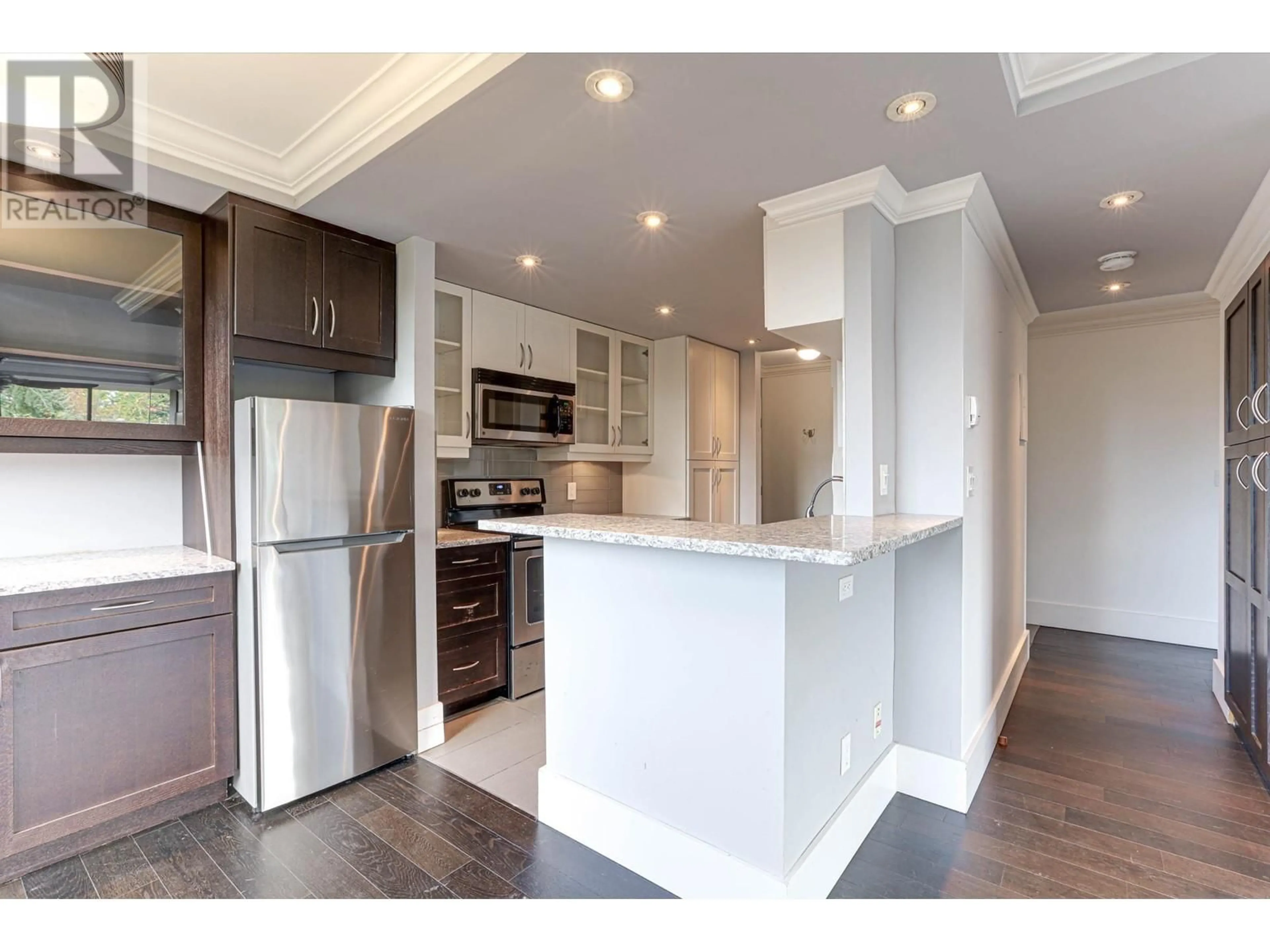 Open concept kitchen, wood/laminate floor for 602 2020 BELLWOOD AVENUE, Burnaby British Columbia V5B4P8