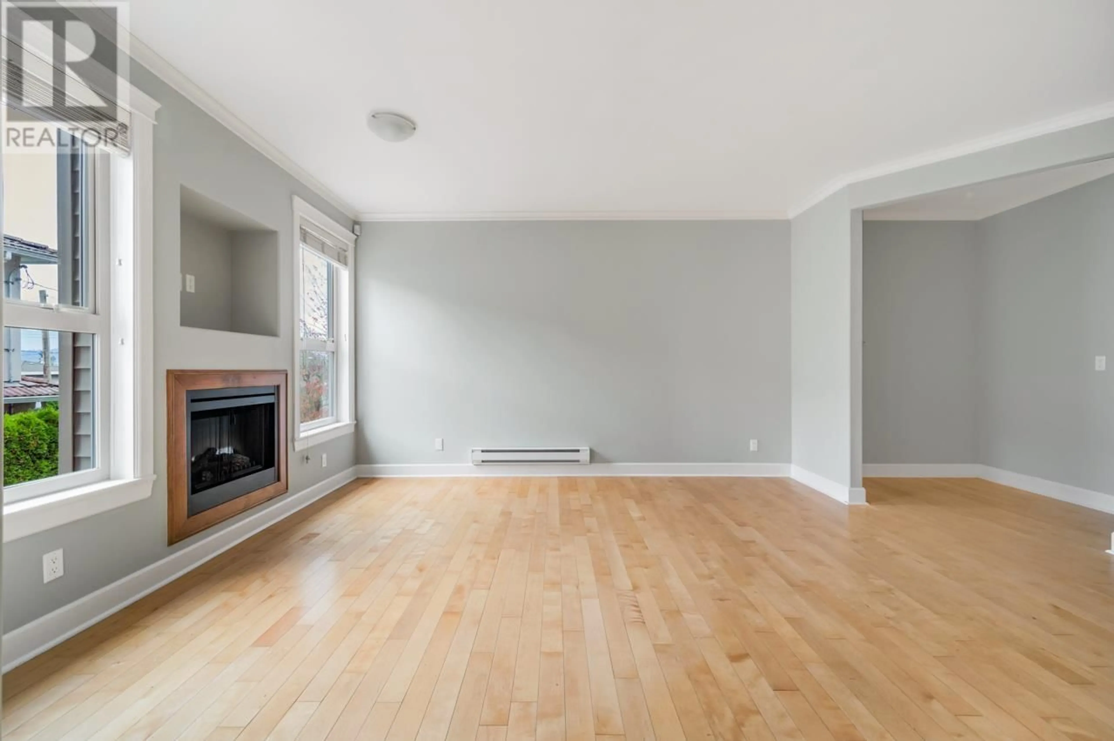 Living room with furniture, wood/laminate floor for 4539 GRANGE STREET, Burnaby British Columbia V5H1P7