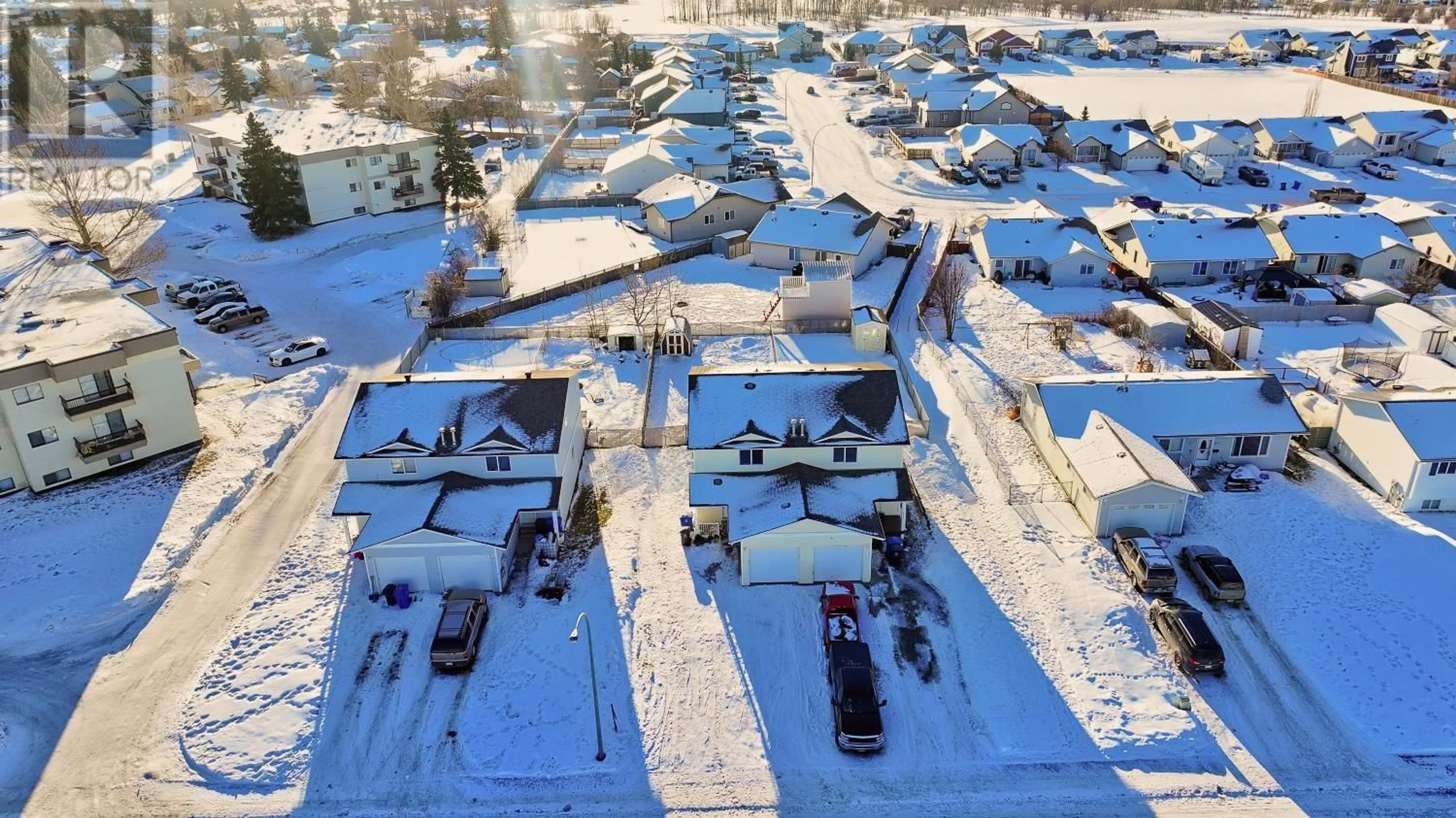 A pic from outside/outdoor area/front of a property/back of a property/a pic from drone, street for 8719 99 AVENUE, Fort St. John British Columbia V1J6T9