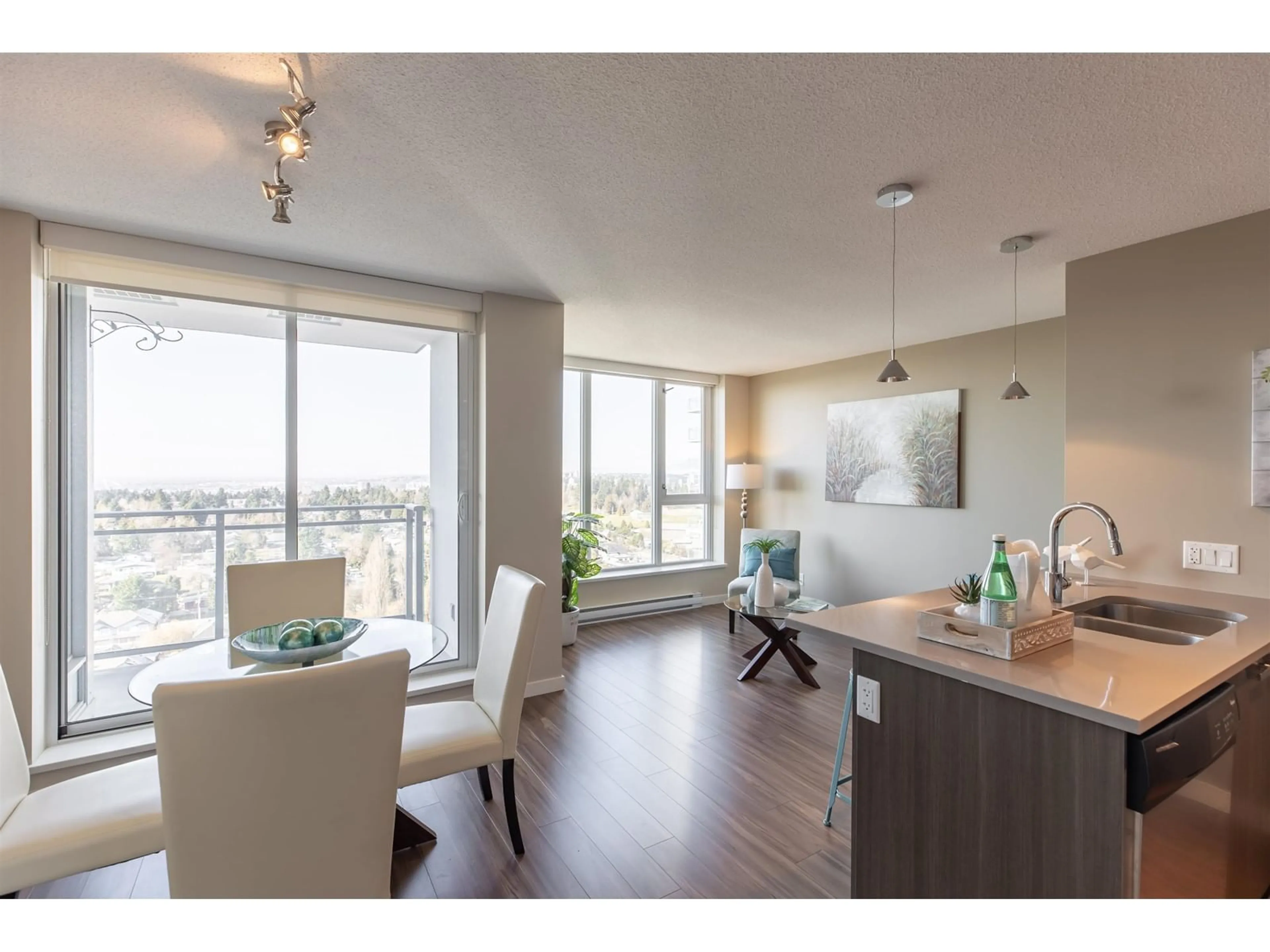 Open concept kitchen, wood/laminate floor for 2215 - 13325 102A, Surrey British Columbia V3T0J5