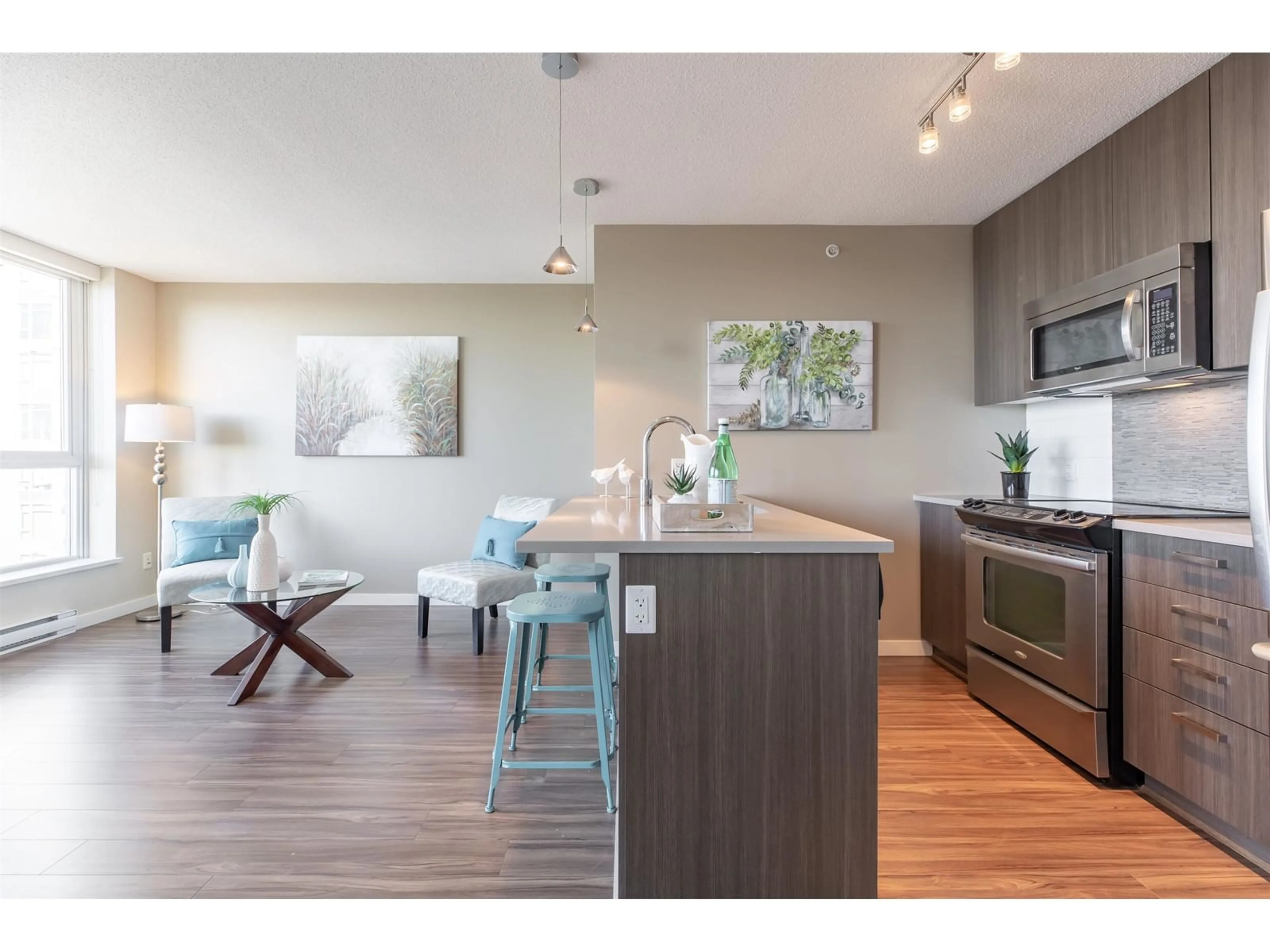 Open concept kitchen, wood/laminate floor for 2215 13325 102A AVENUE, Surrey British Columbia V3T0J5